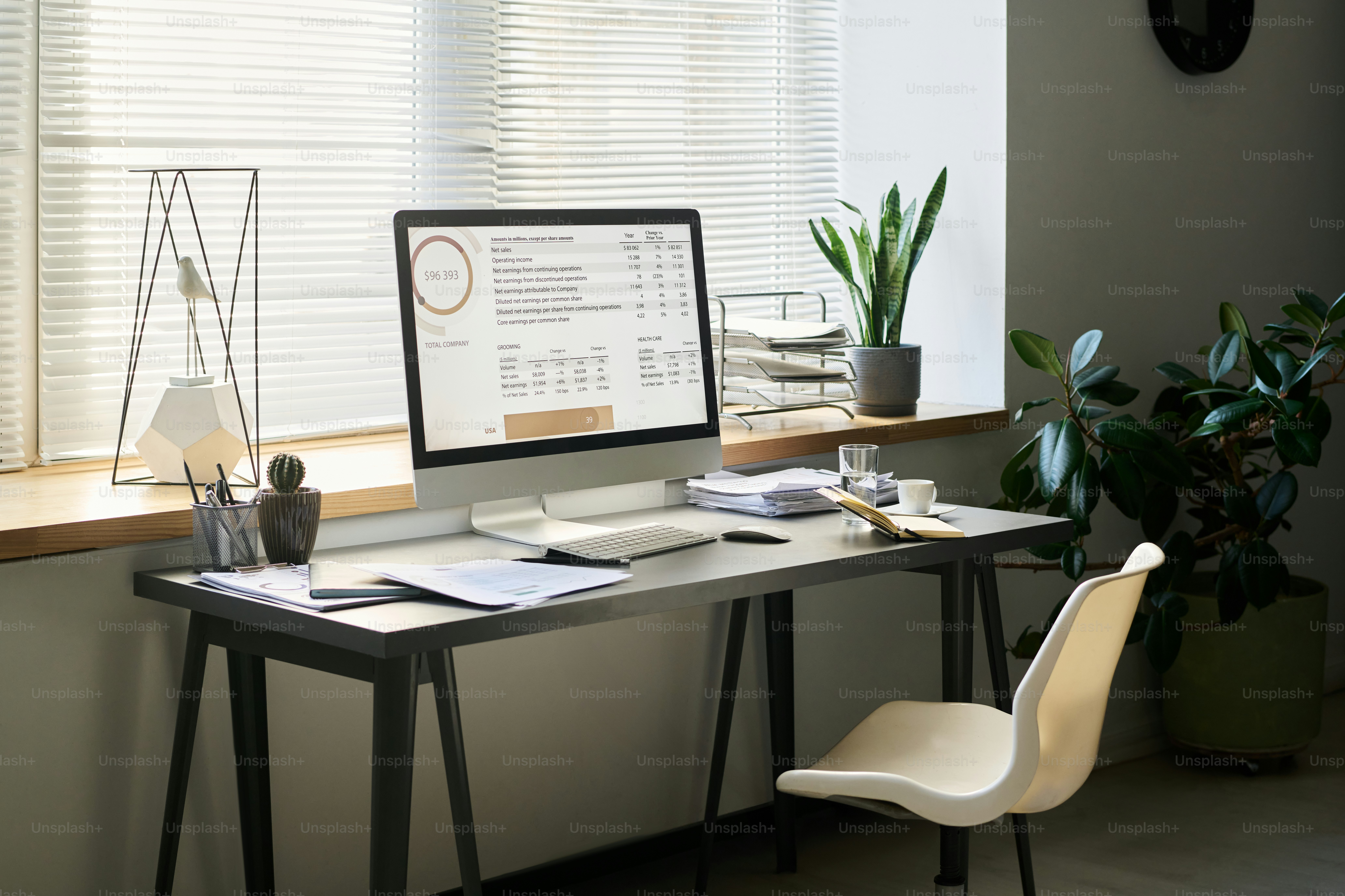 Workplace of modern analyst with desktop computer and keypad, financial ...