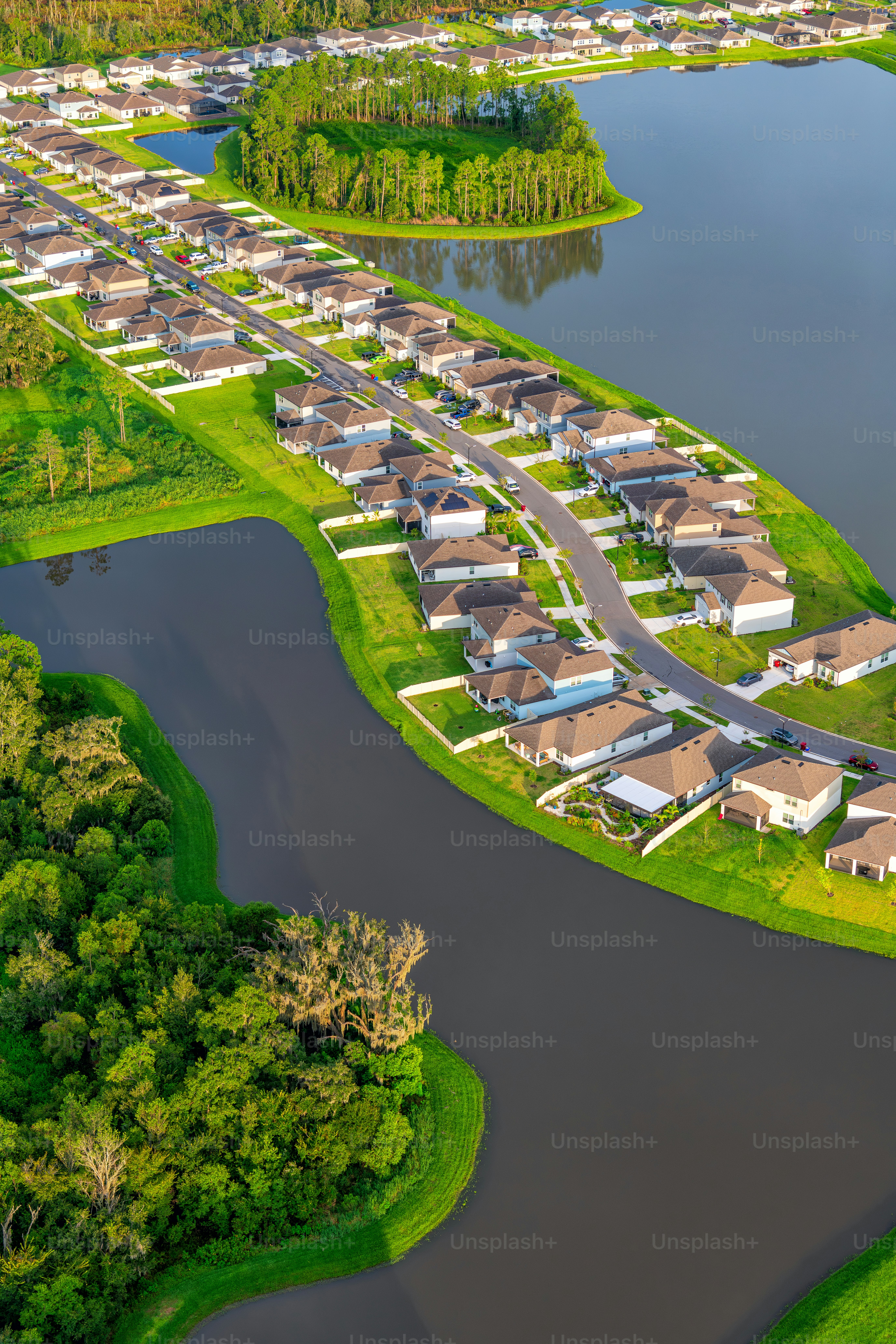 Aerial view of a suburban Tampa subdivision located in Lakeland just east of downtown Tampa shot via helicopter from an altitude of about 900 feet.