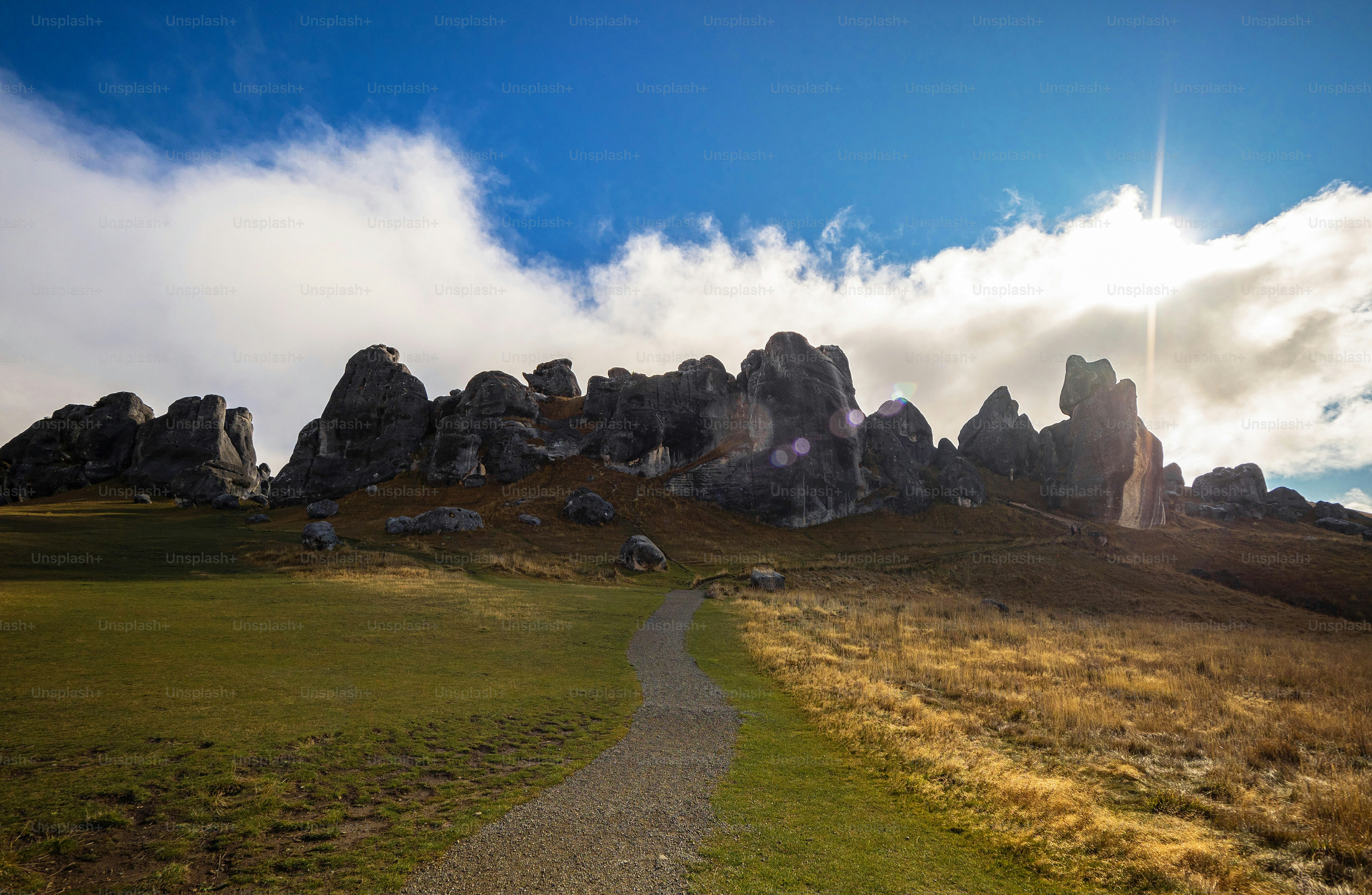 Nature landscape panorama view of large limestone boulder rocks in dry  grass vegetation at Castle Hill countryside park in Canterbury South Island  New Zealand photo – Mountain landscape Image on Unsplash, image size:3000x1958