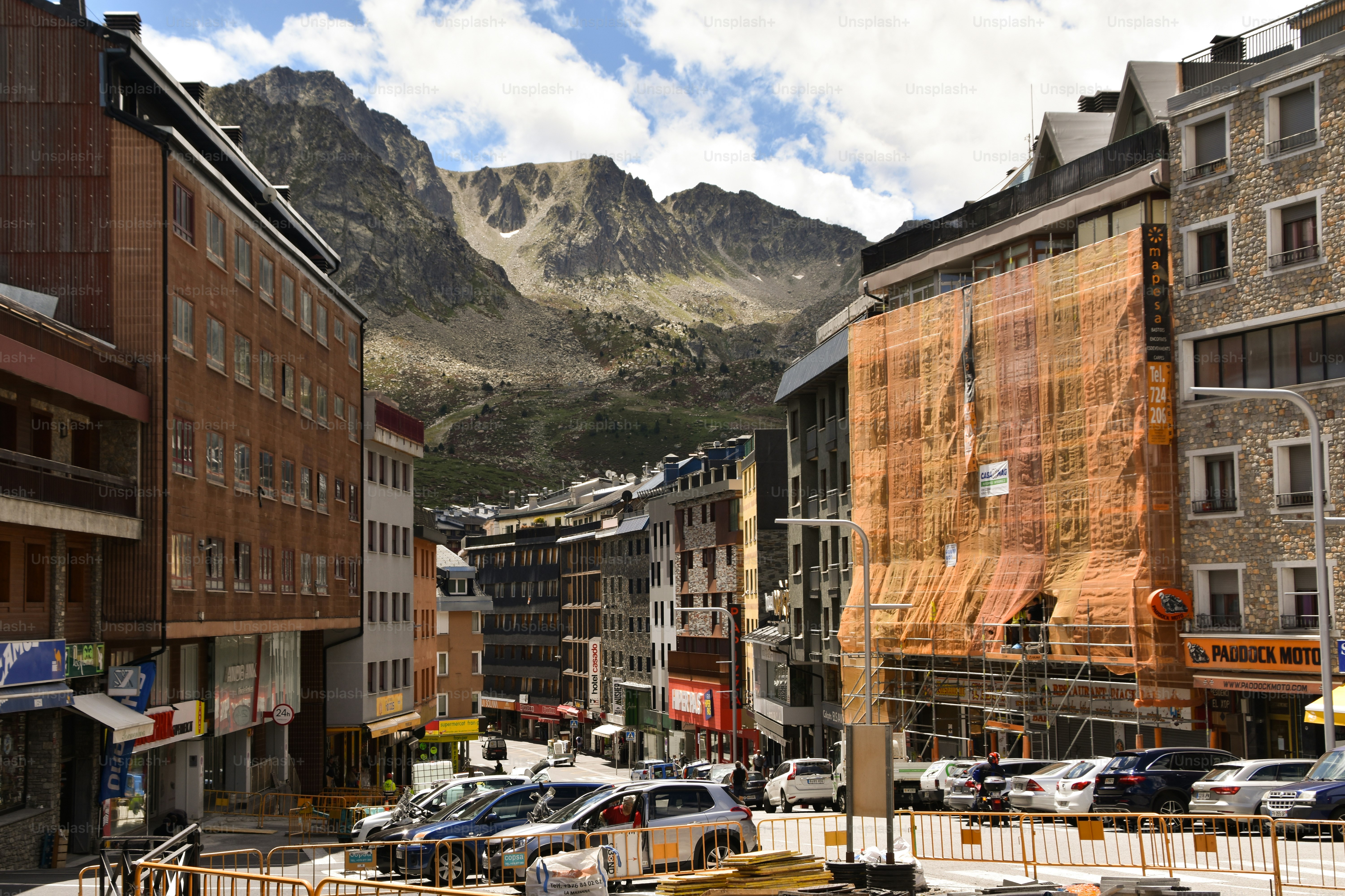 City street with mountain backdrop in Pas de la Casa, Andorra