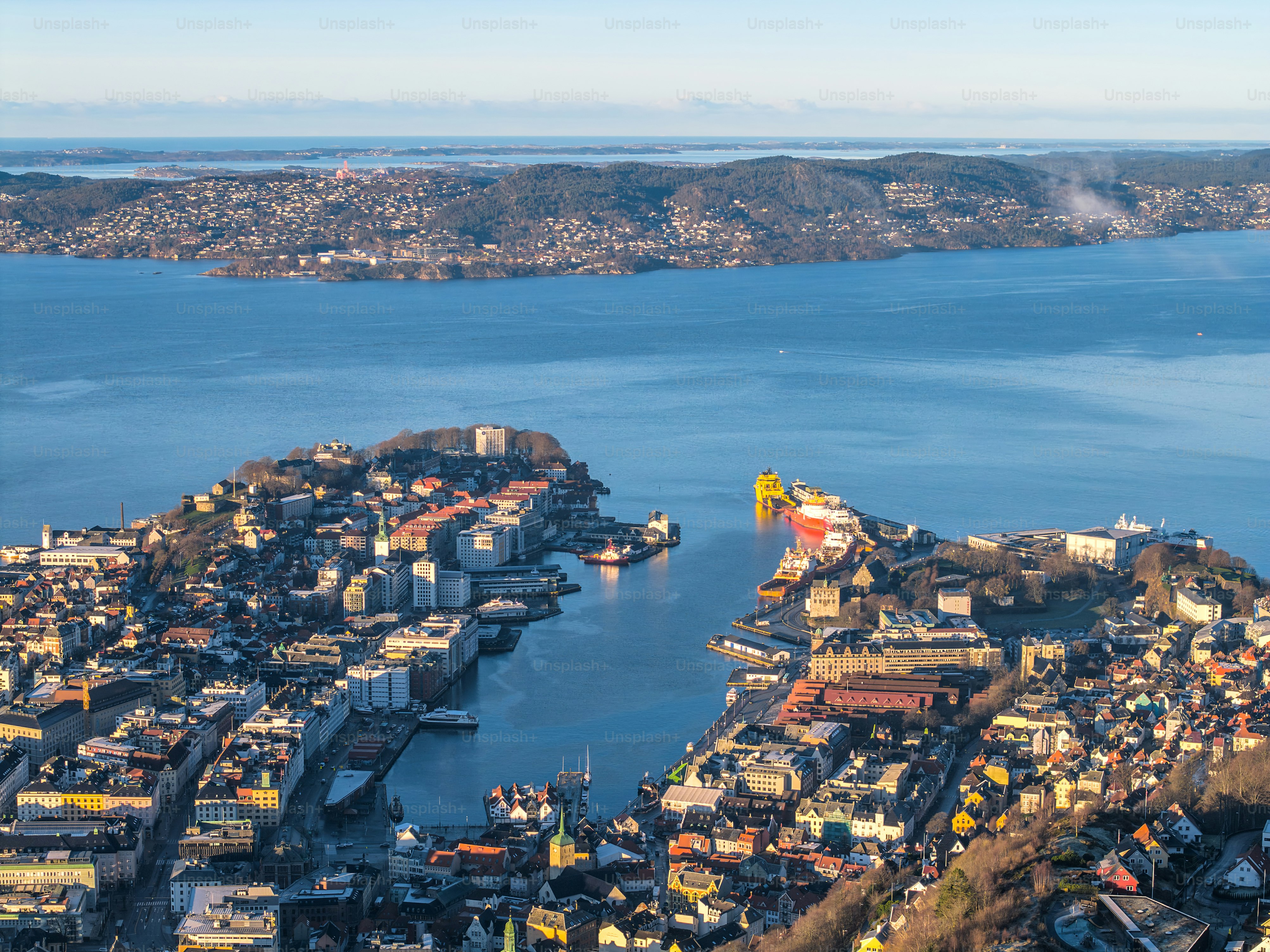 Daytime high aerial panorama historic city fjord town Bergen, Norway