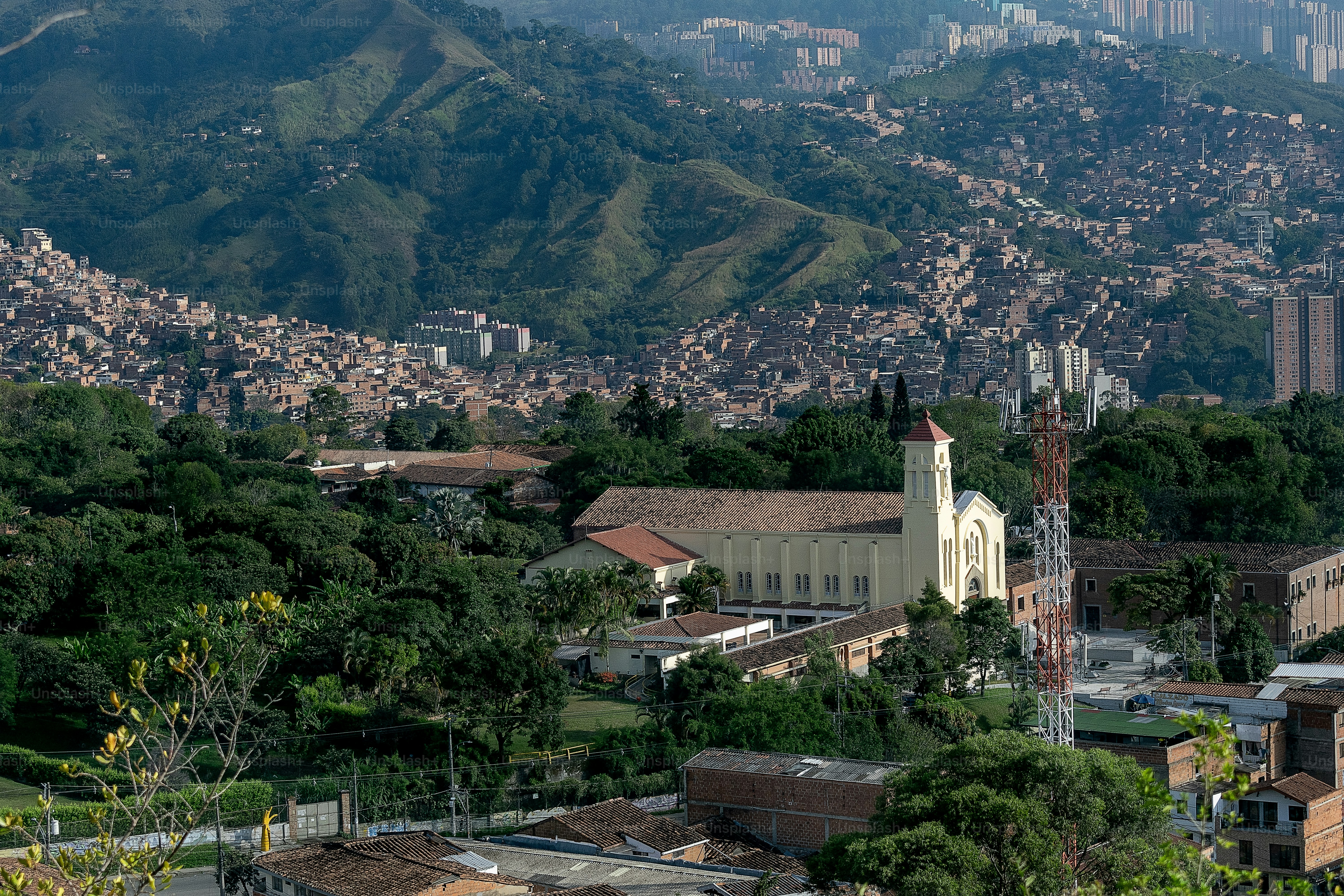 Medellín skyline with church and mountains