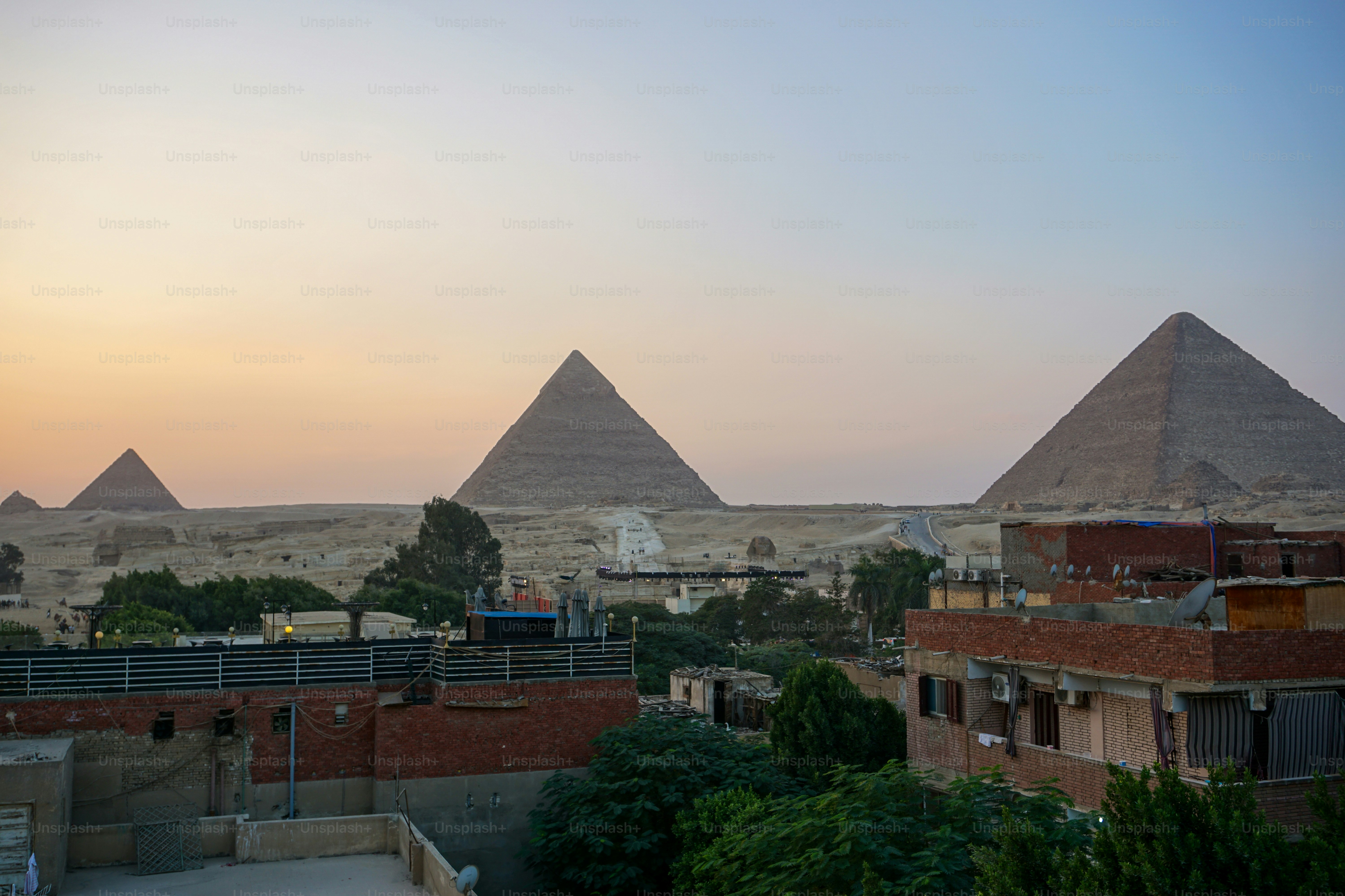 Breathtaking View of the Three Pyramids of Giza at Sunrise Cairo Egypt  Majestic Ancient Wonders