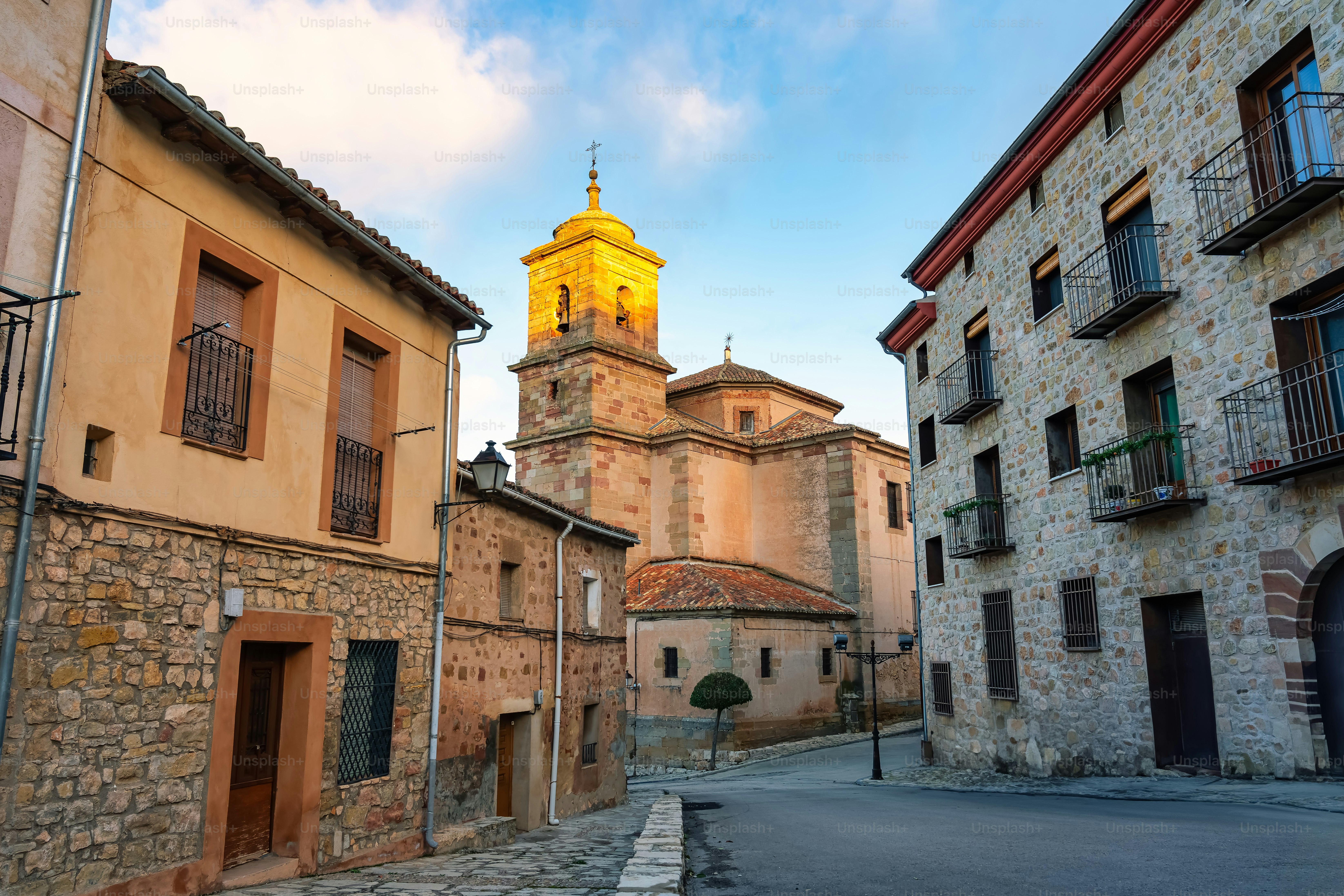 Old stone church at sunset in the medieval town of Castile-La Mancha, Siguenza