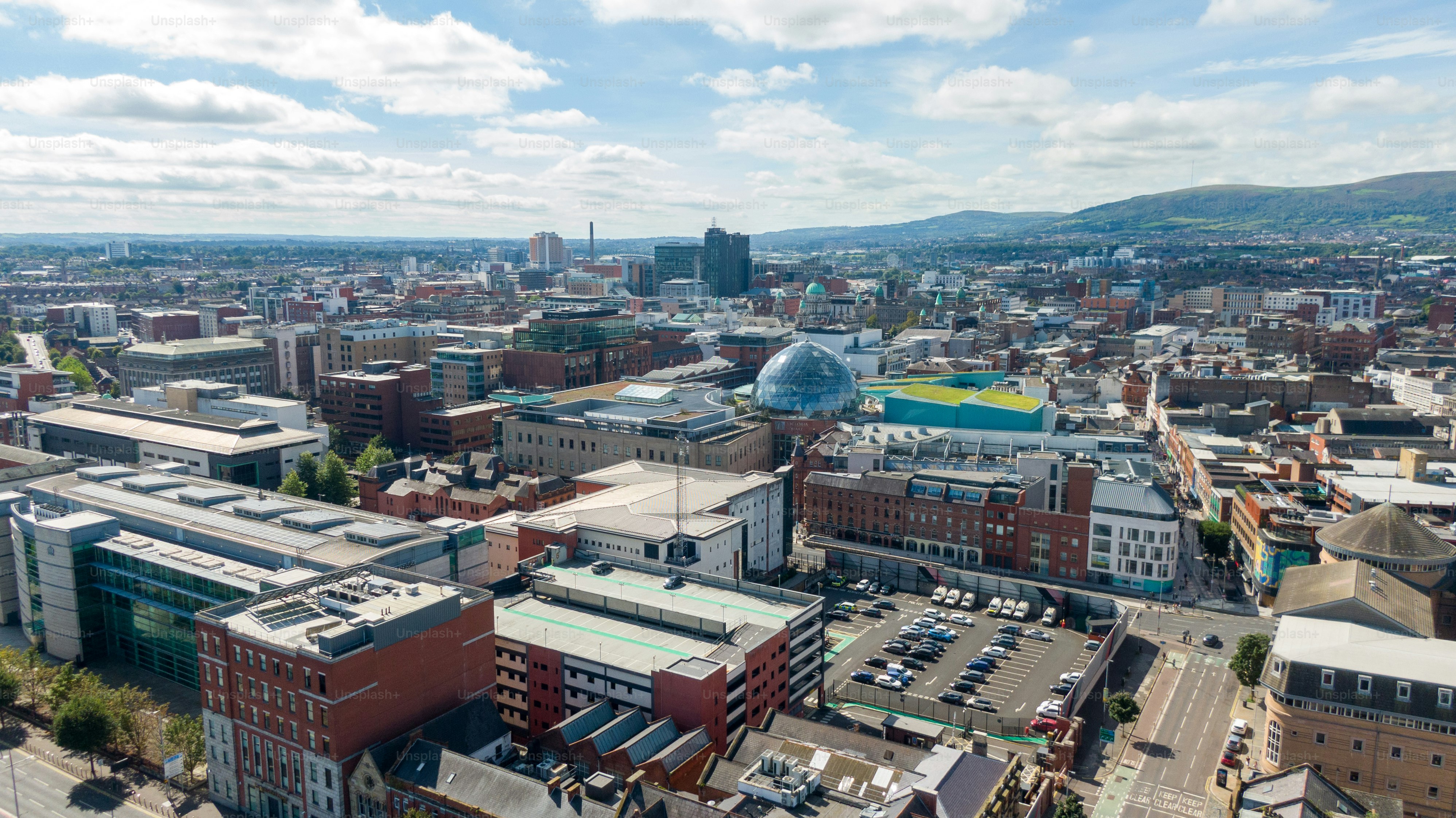 Aerial view on buildings and Lagan River in City center of Belfast Northern Ireland. Drone photo, high angle view of town