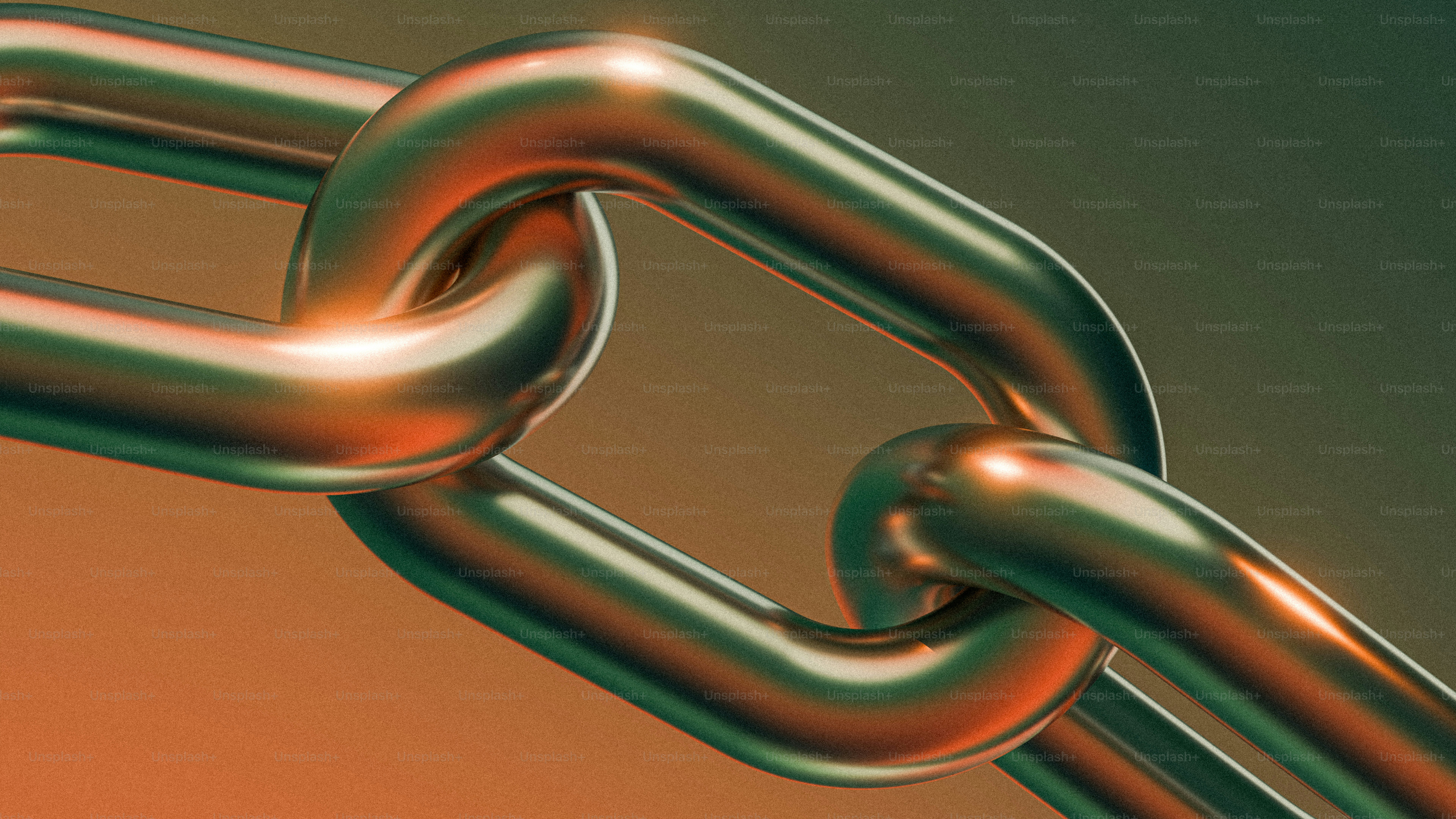 Close-up of a gold chain and its links.