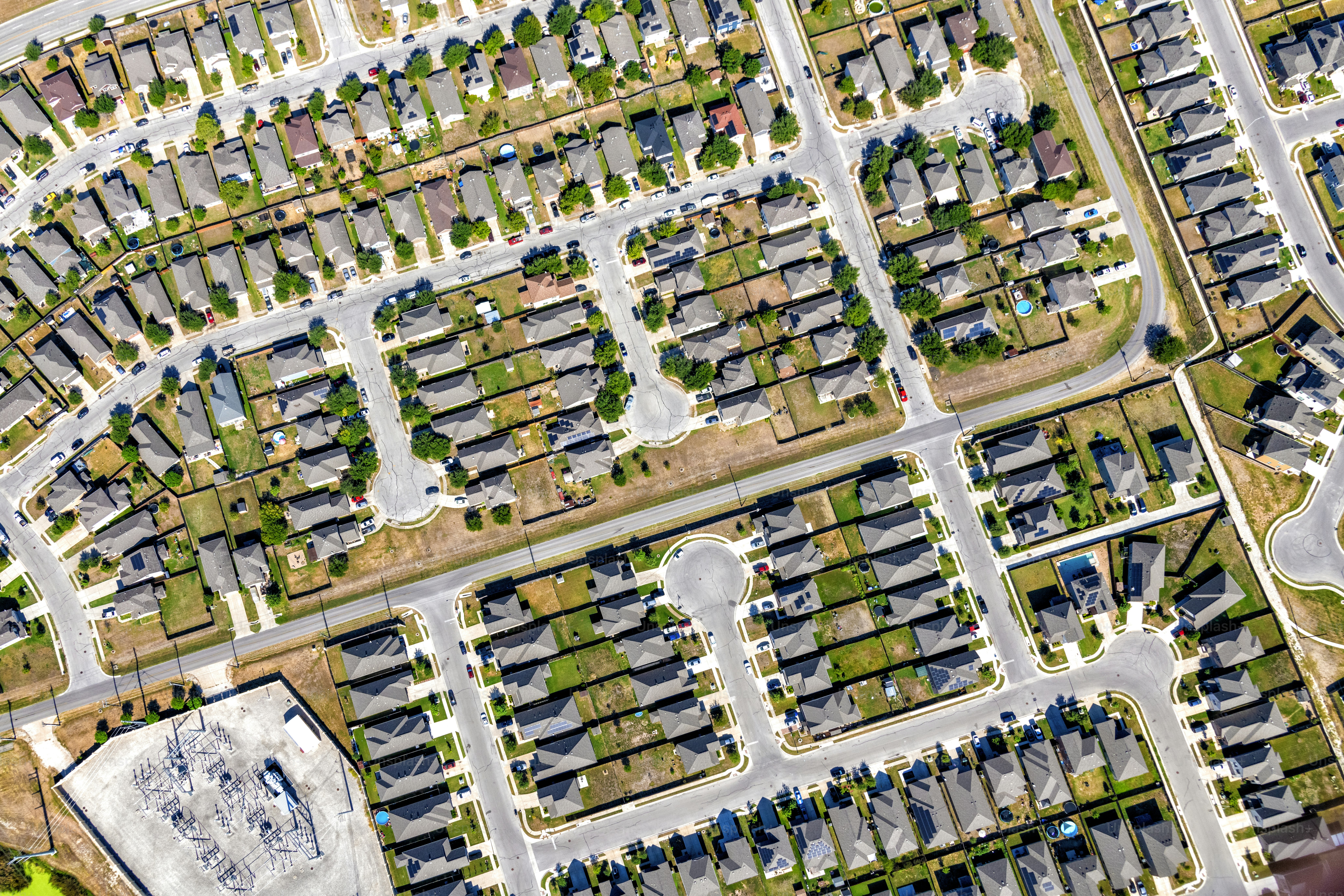 A large master planned, suburban residential community located near Pflugerville, Texas about 20 miles north of downtown Austin shot from an altitude of about 1200 feet on a clear sunny morning.