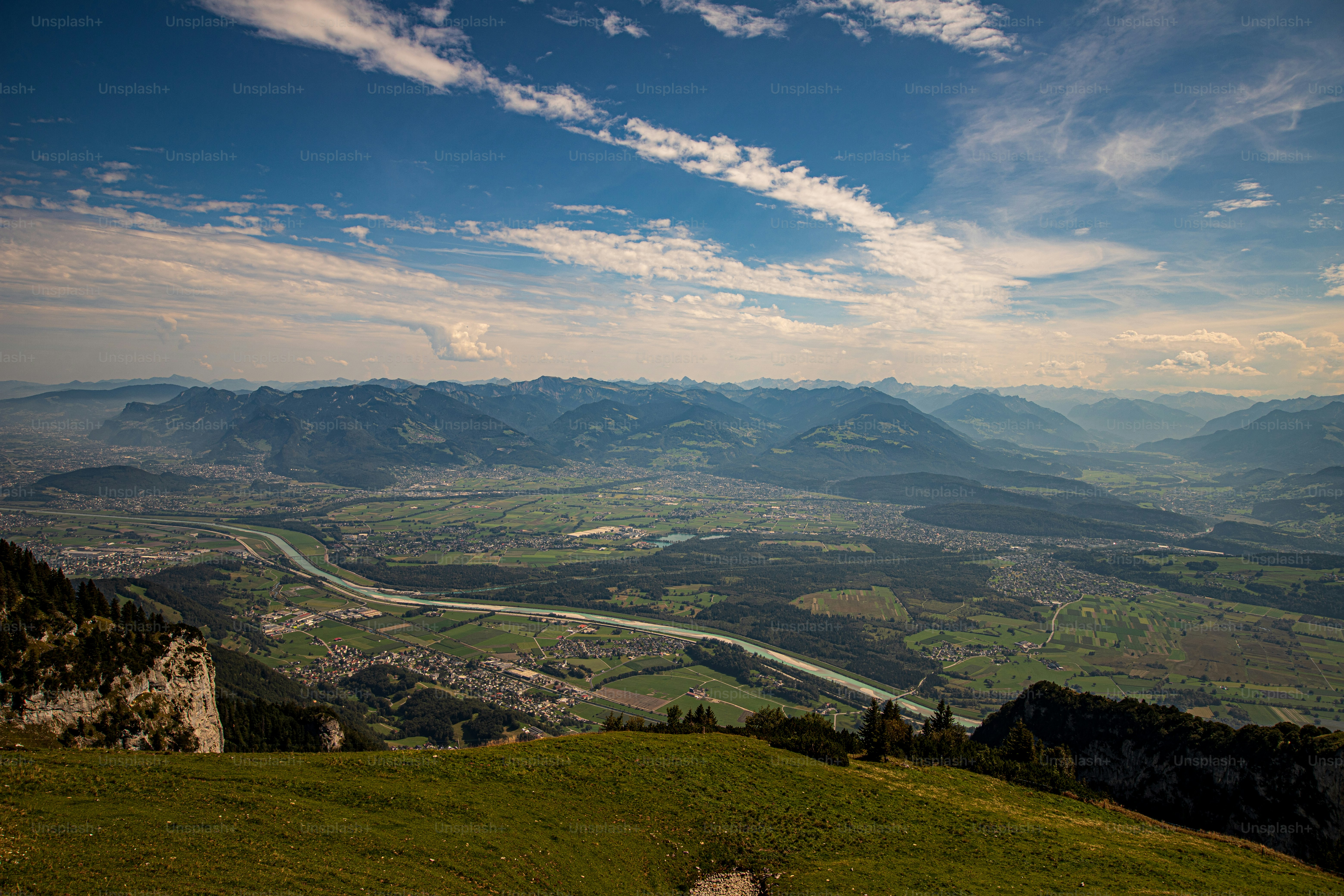 A mountain peak with trails, a cable car, a revolving restaurant and stunning panoramic views.