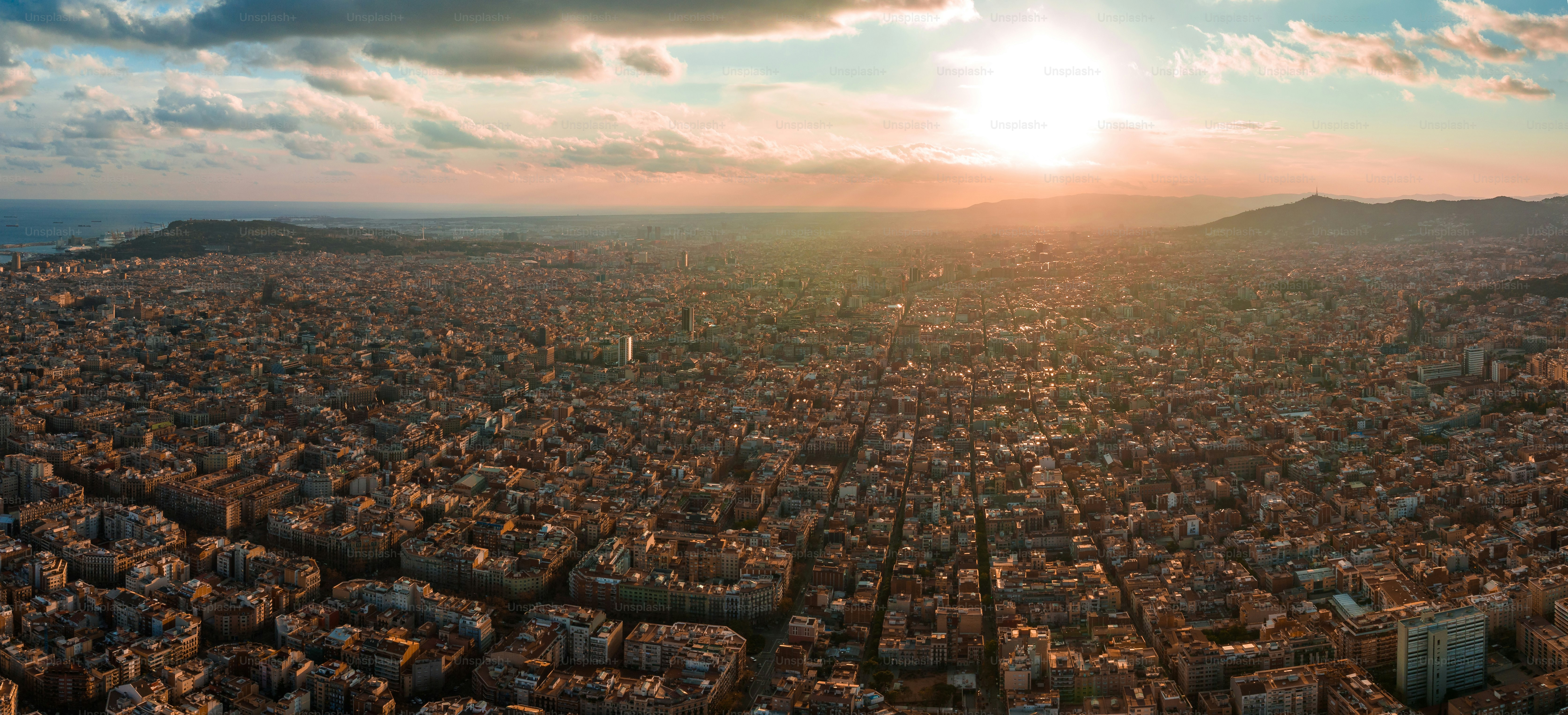 Barcelona street aerial view with beautiful patterns in Spain. Barcelona sunset skyline aerial view with buildings in Spain. Magical sunset over Barcelona.