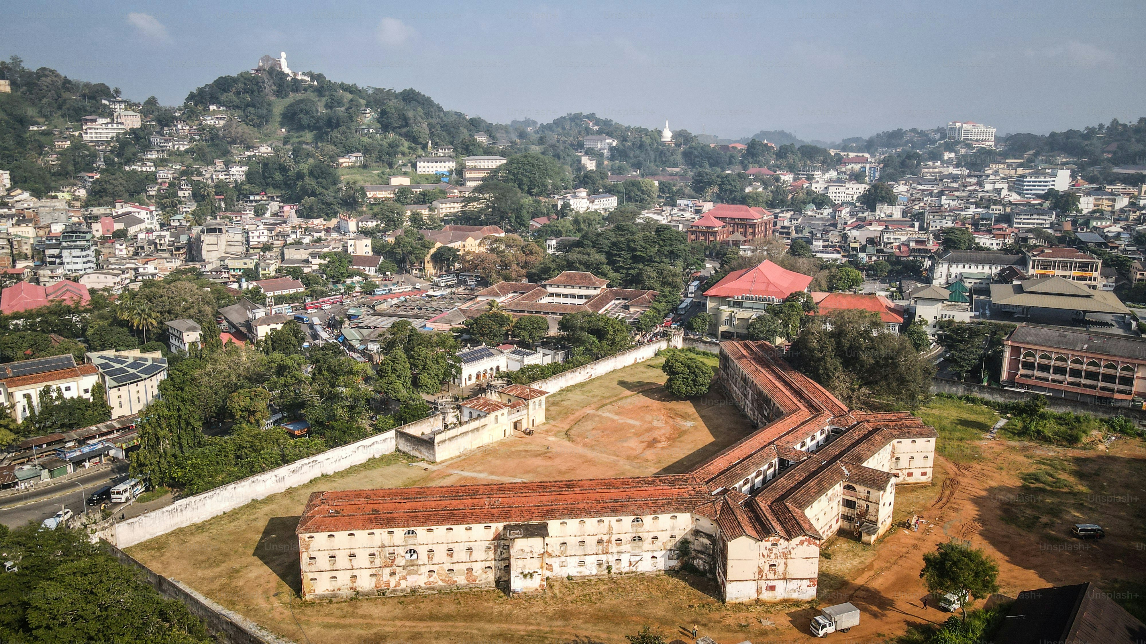 Kandy is a large city in central Sri Lanka. It's set on a plateau surrounded by mountains, which are home to tea plantations and biodiverse rainforest.