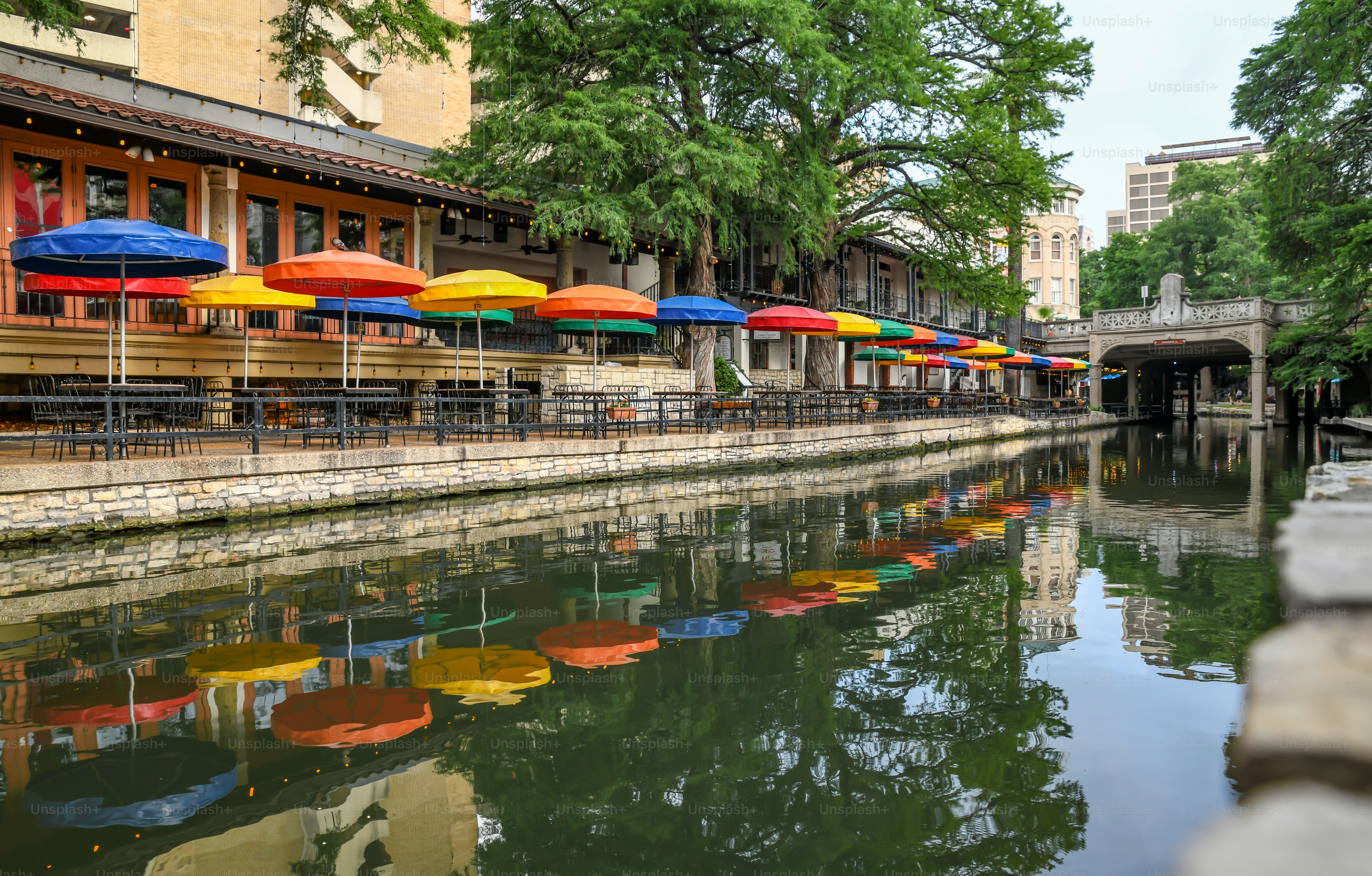 San Antonio River Walk restaurant with parasols