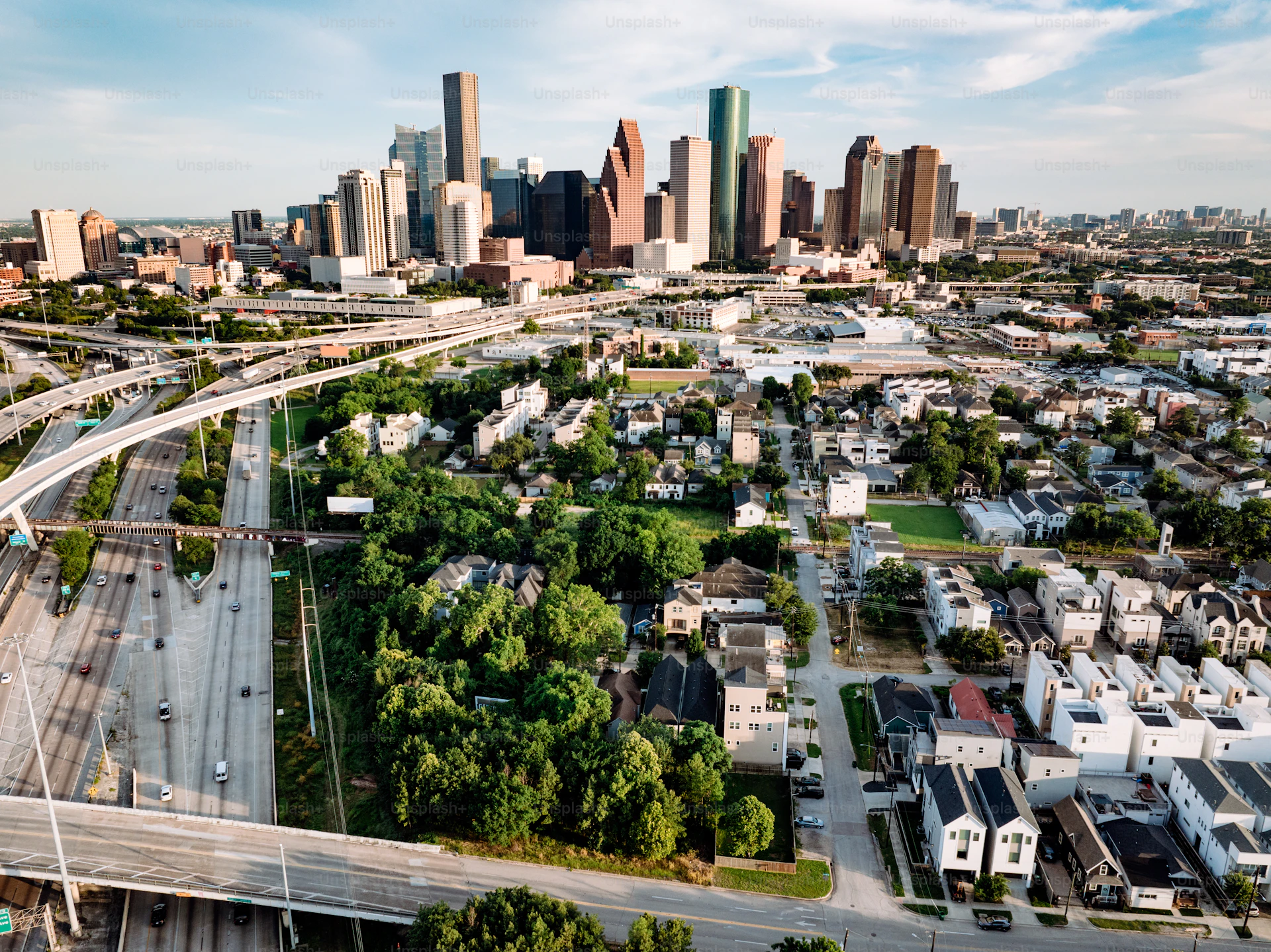 Aerial drone view of city at sunset