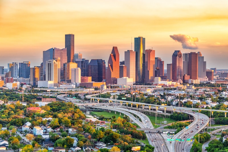 Houston skyline reflected in Buffalo Bayou at twilight