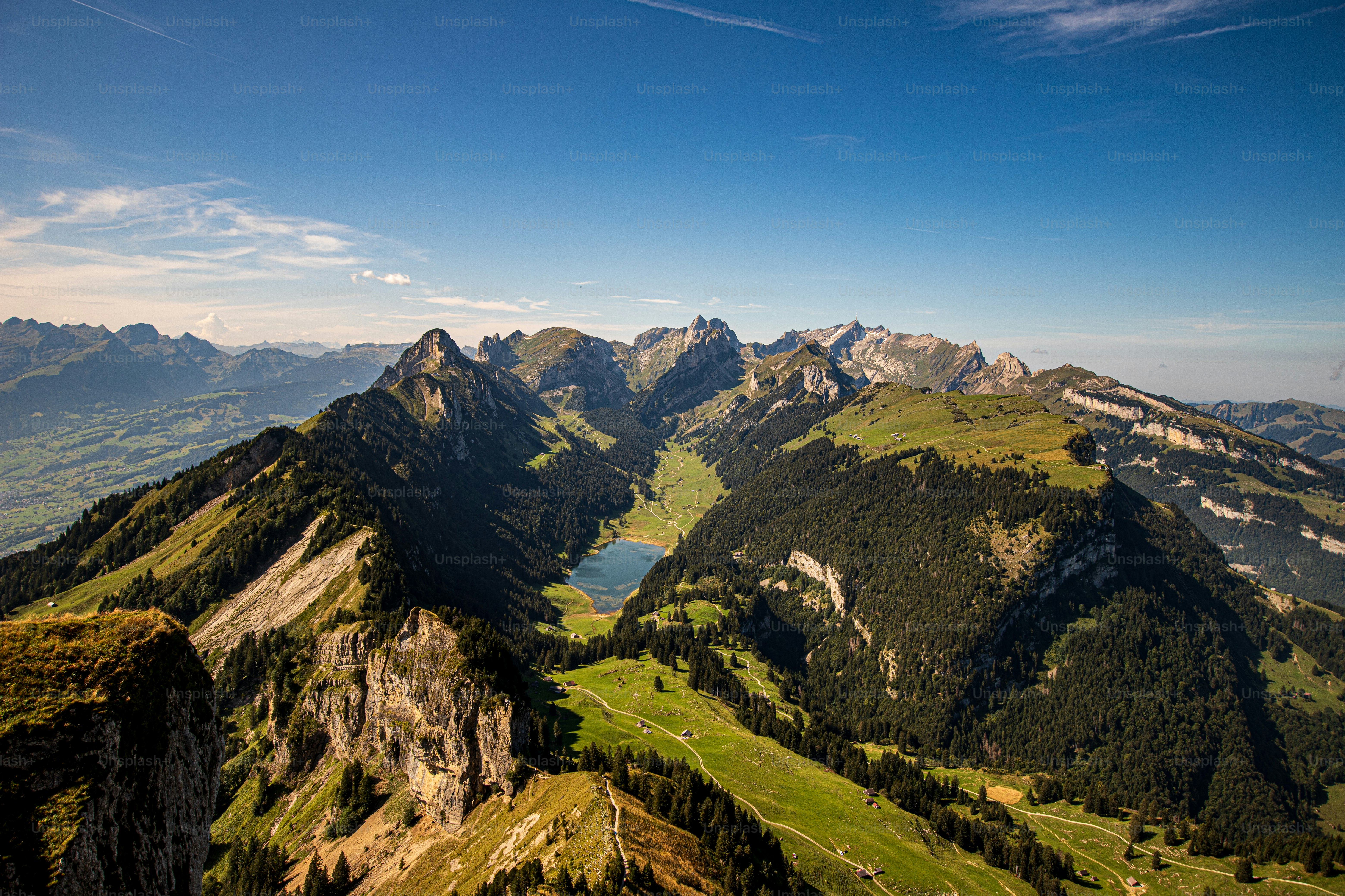 A mountain peak with trails, a cable car, a revolving restaurant and stunning panoramic views.