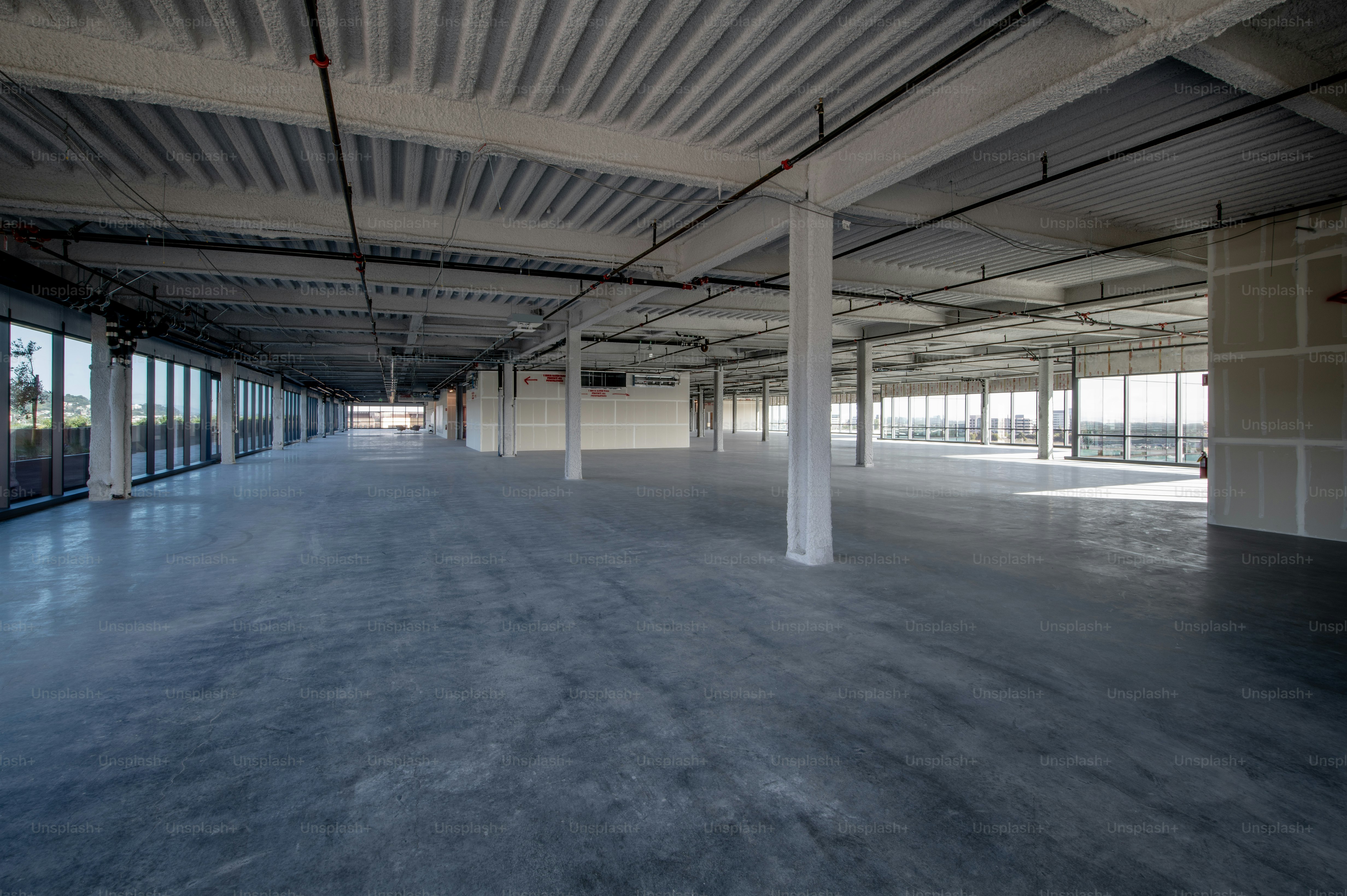 Empty, unimproved, raw office space.