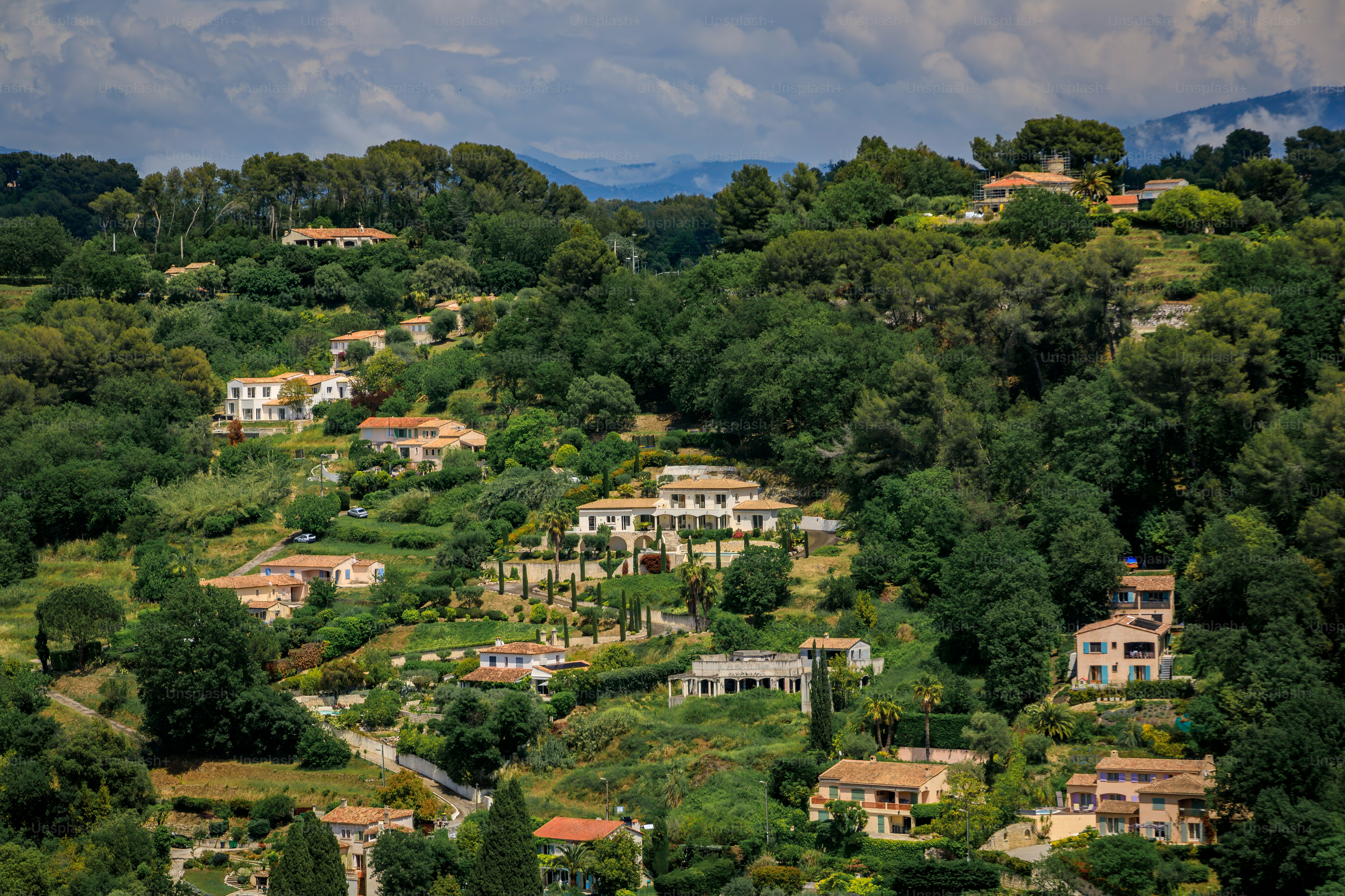 Traditional old stone houses and villas in the Alpes mountains surrounding the medieval town of Saint Paul de Vence, French Riviera, South of France
