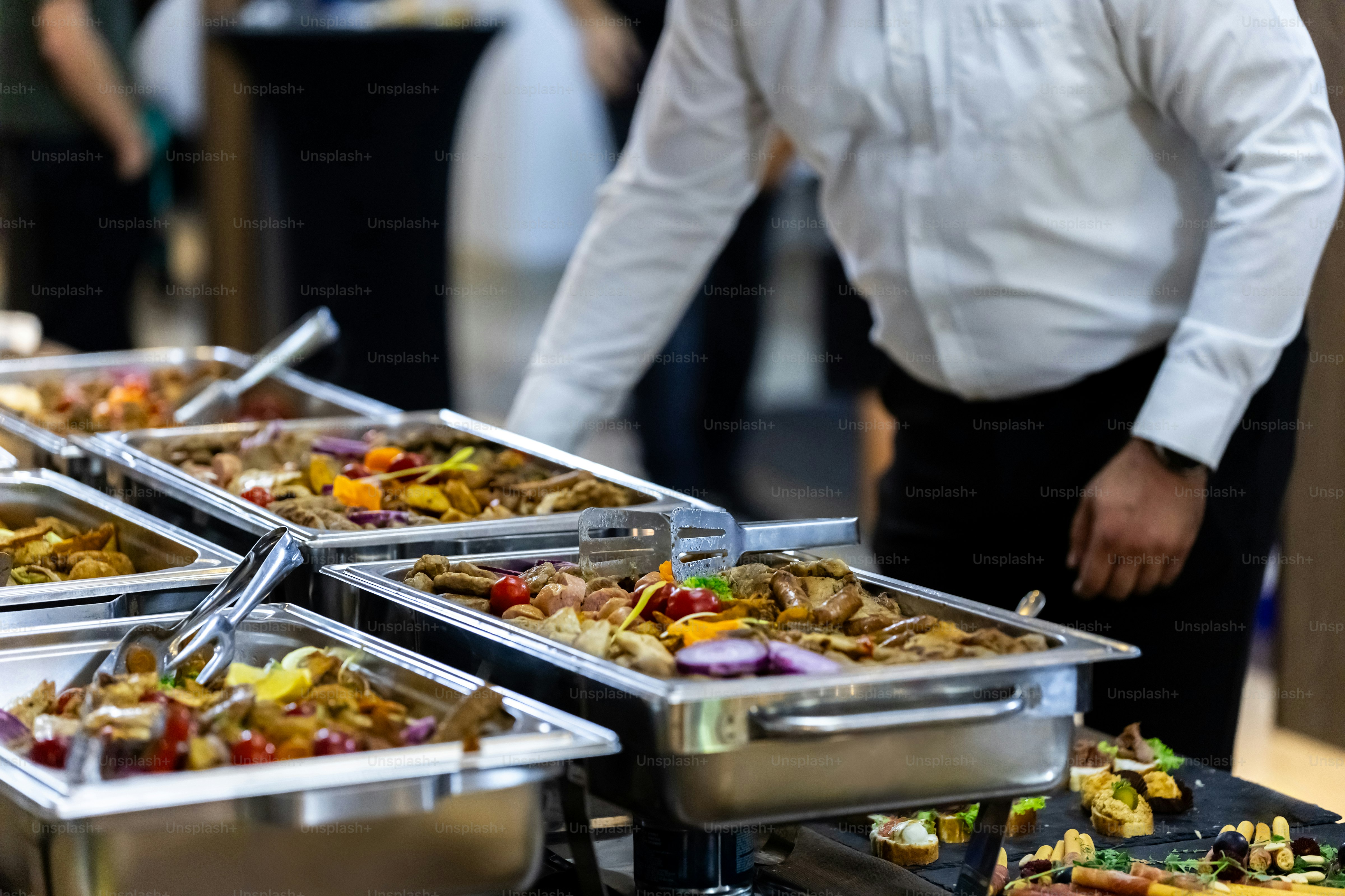 An array of buffet dishes is displayed, showcasing a variety of ...