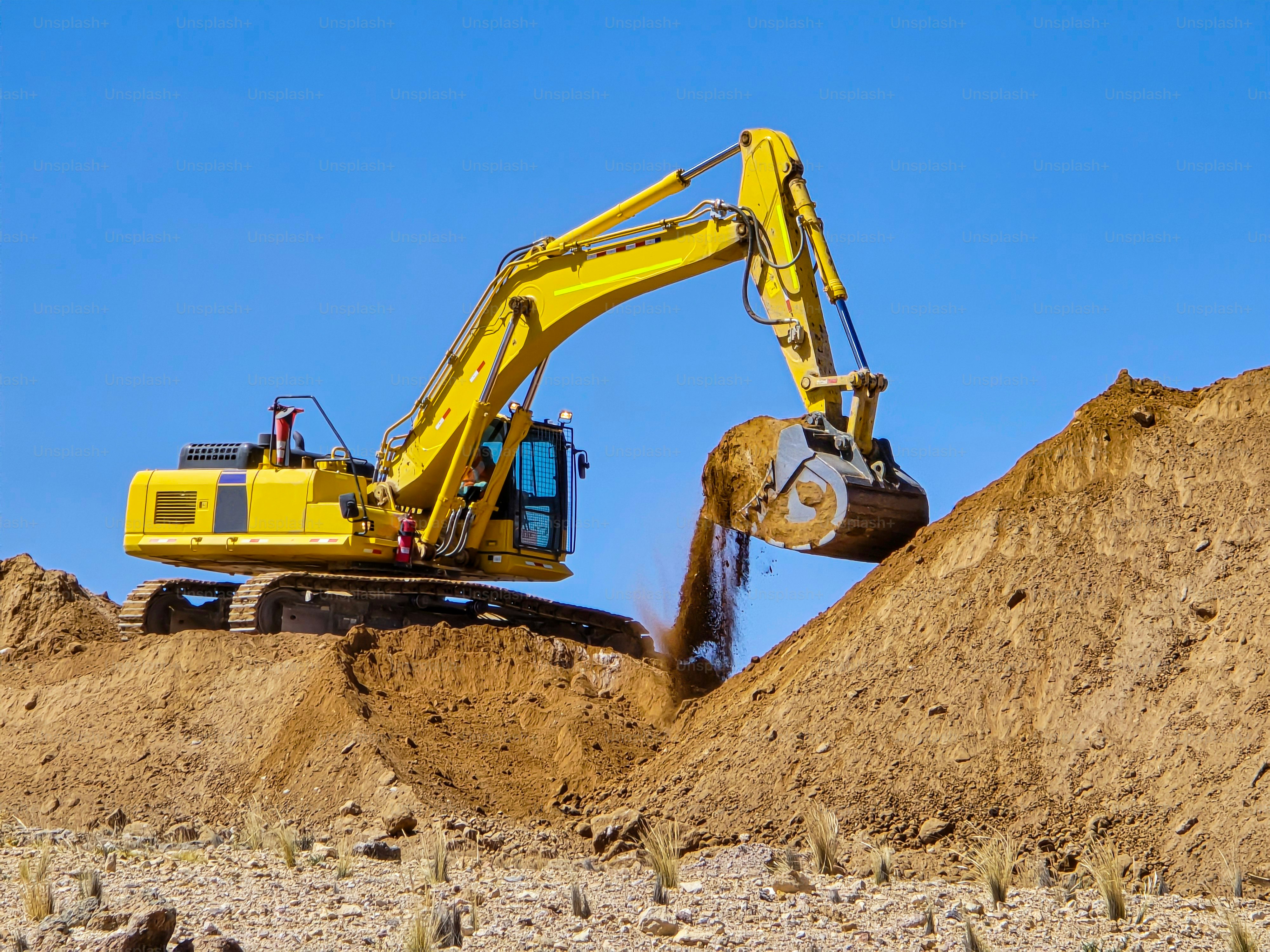 Excavator-type earthmoving machinery extracting materials
