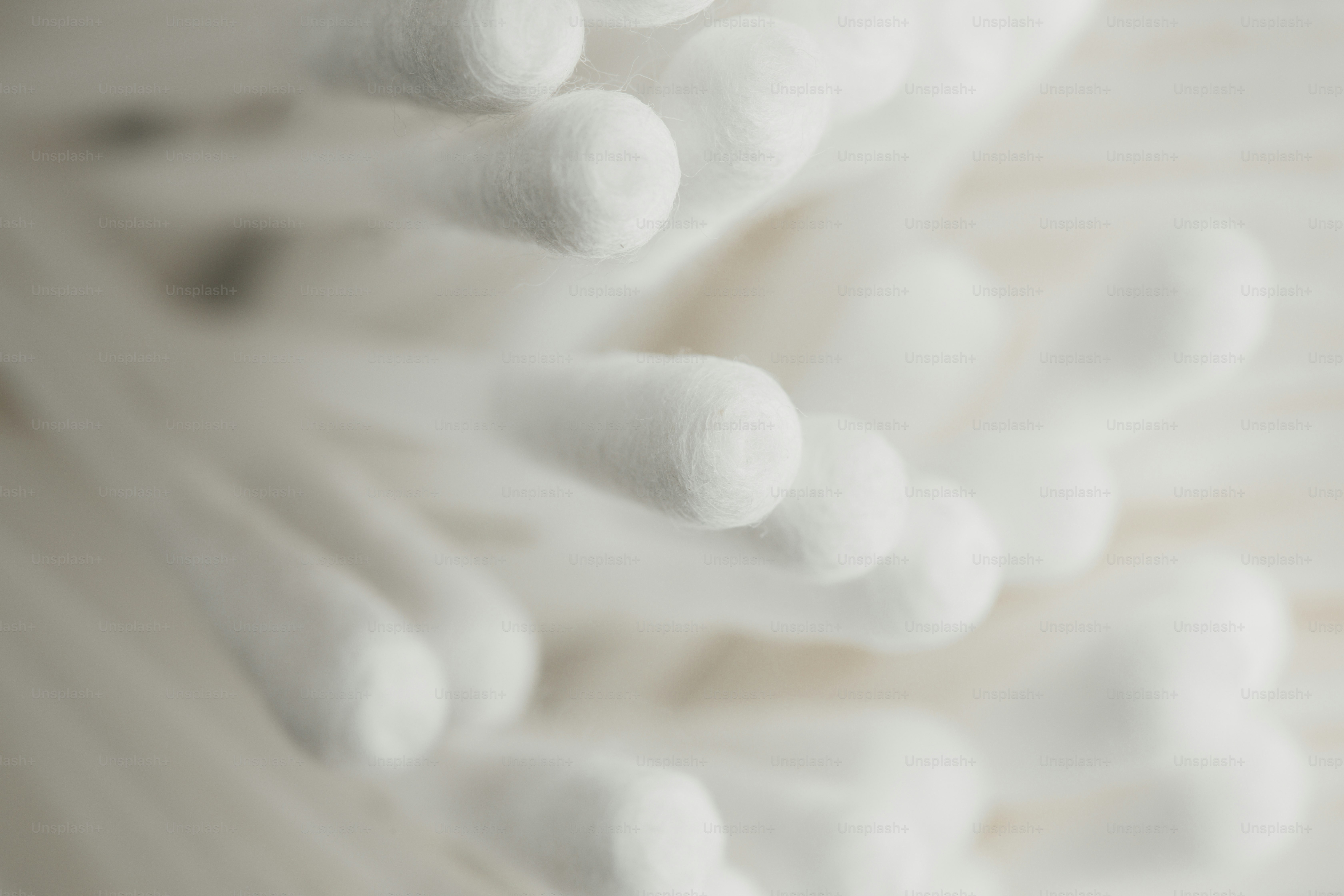 Close-up of white cotton swabs