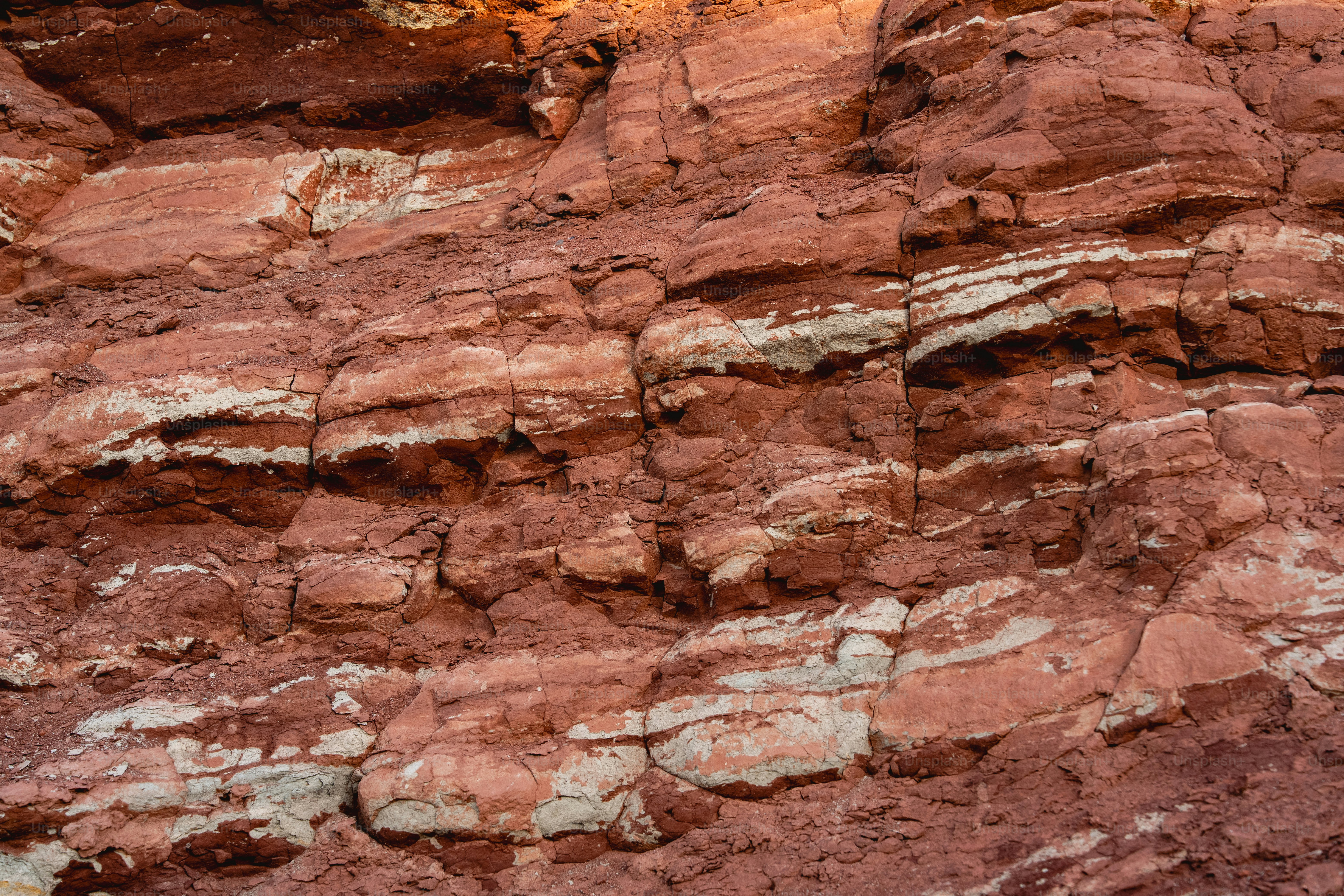 Red and white rock strata are visible.