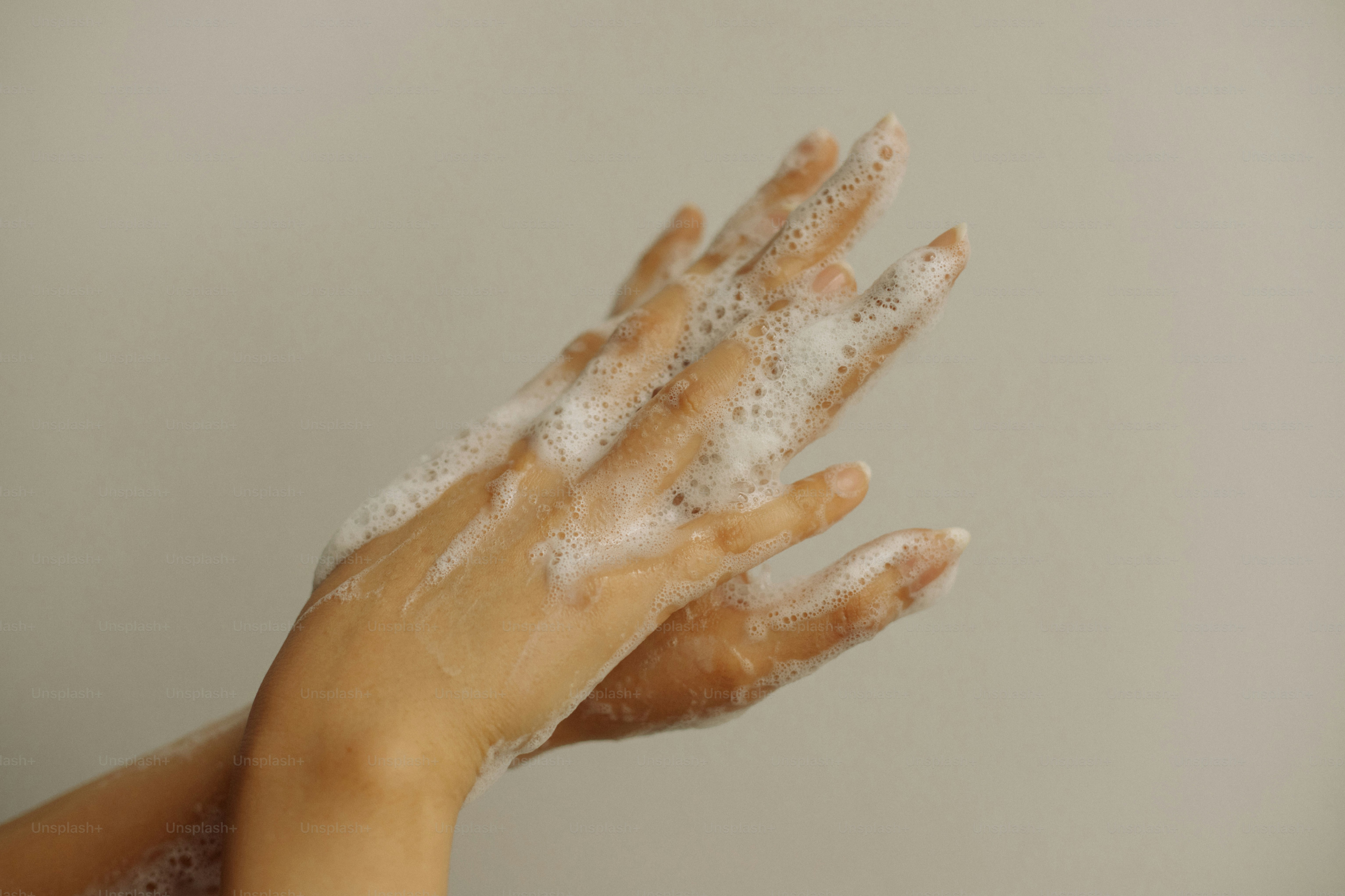 Hands being washed with soap and water photo – Health Image on Unsplash