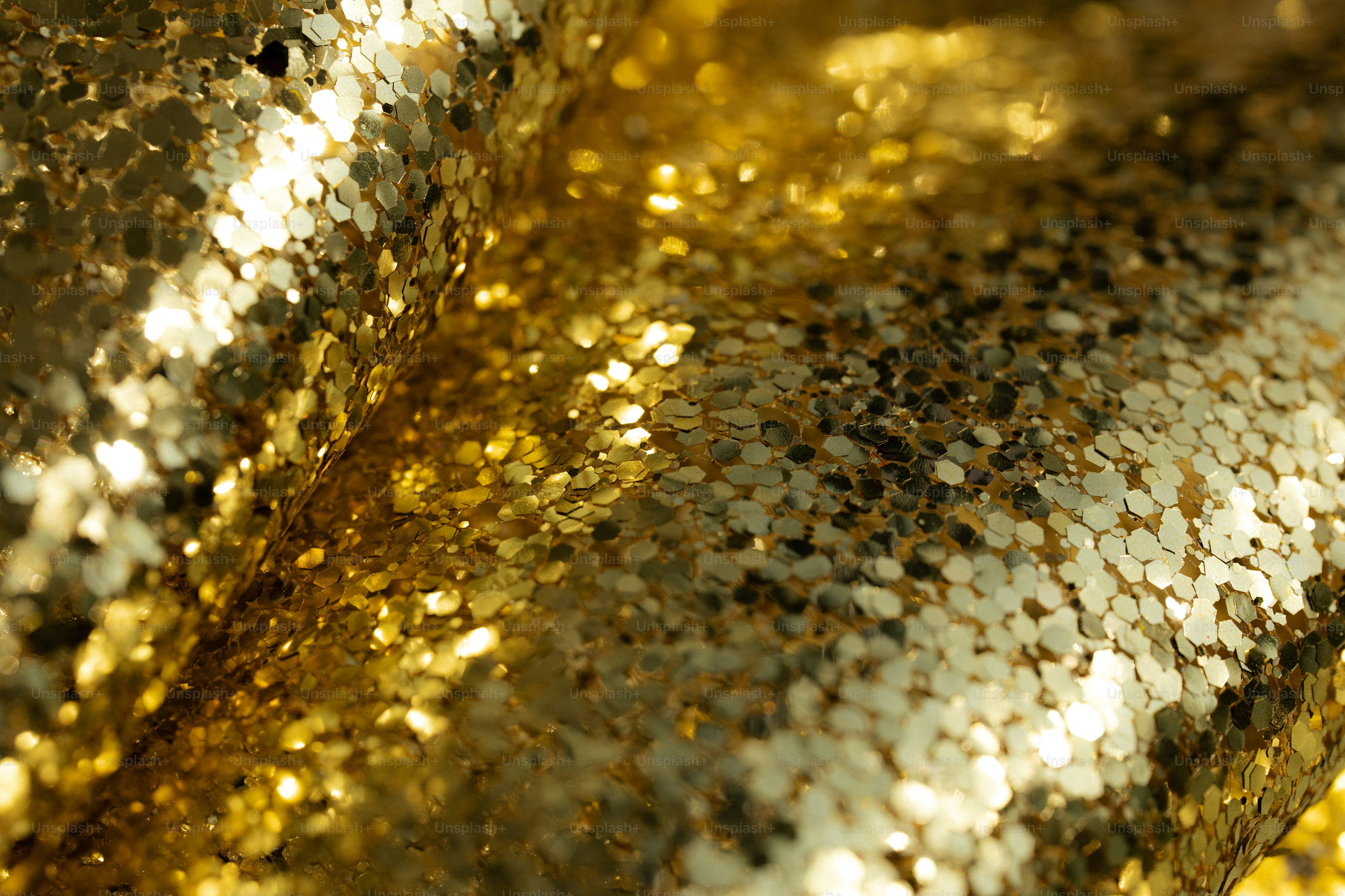 Shiny gold glitter sparkles.