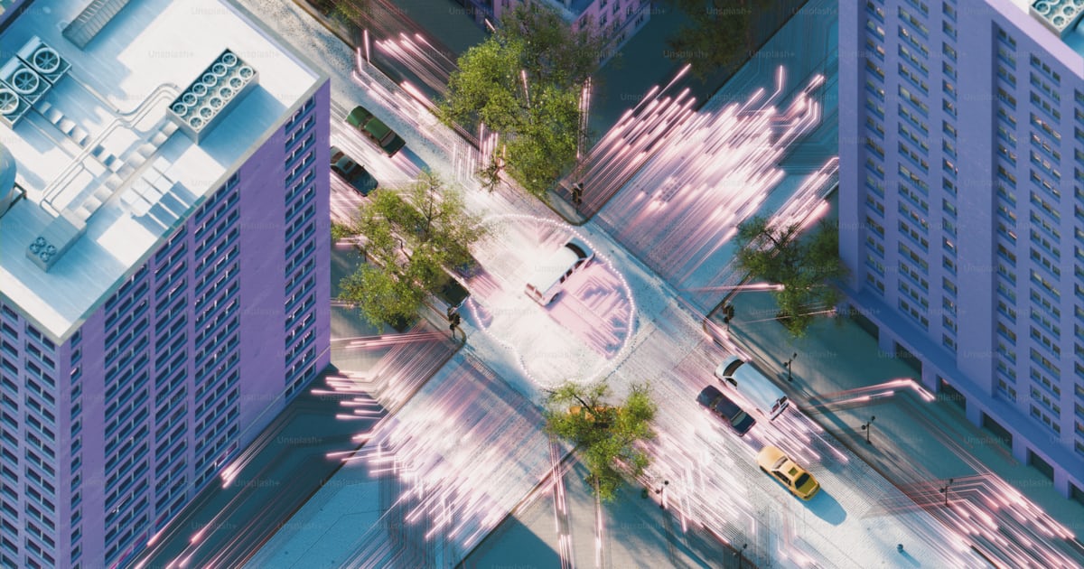 An aerial view of a city street intersection. photo – Render Image on ...