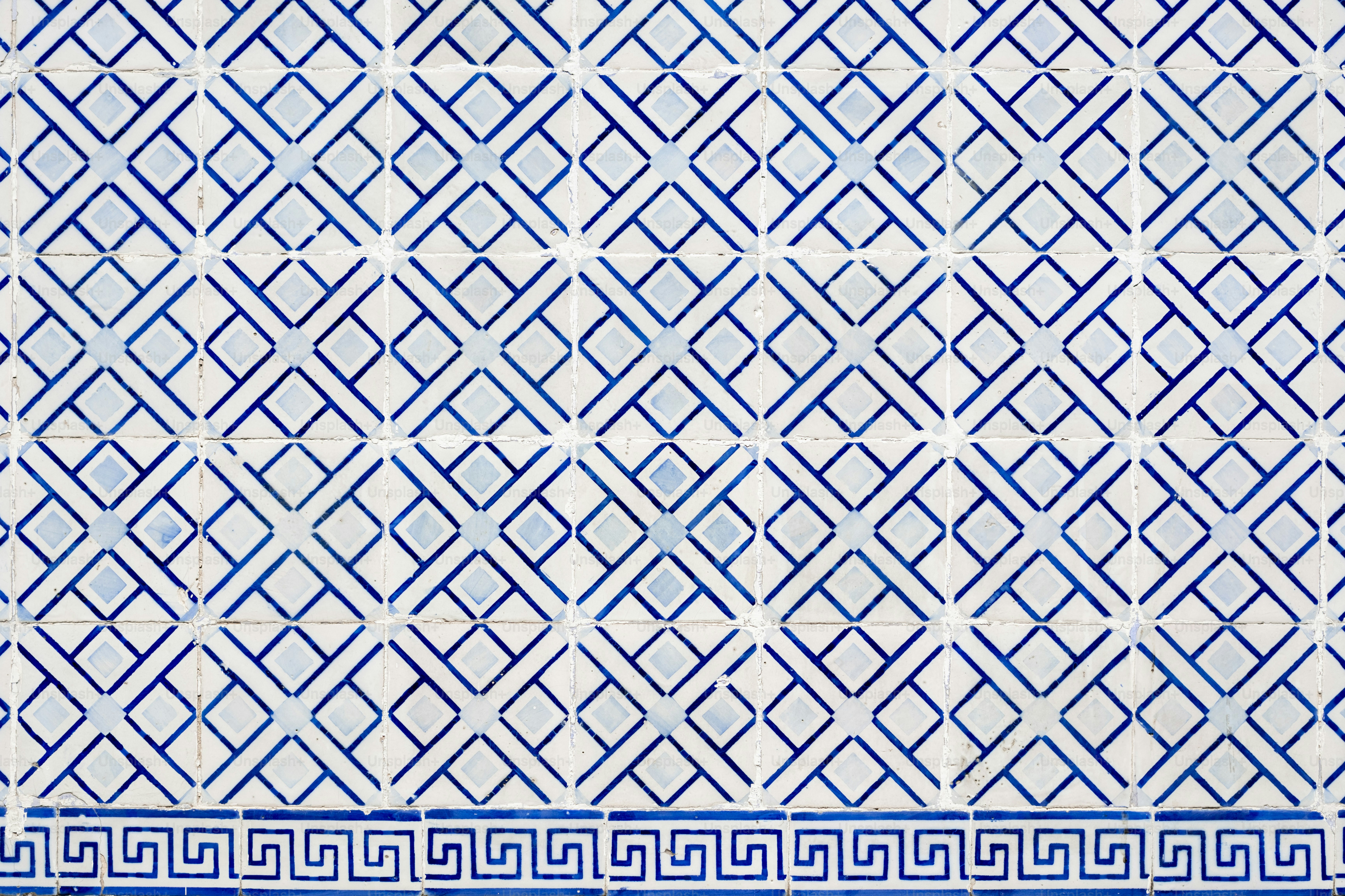 Geometric pattern of squares and diamonds in blue and white. photo ...