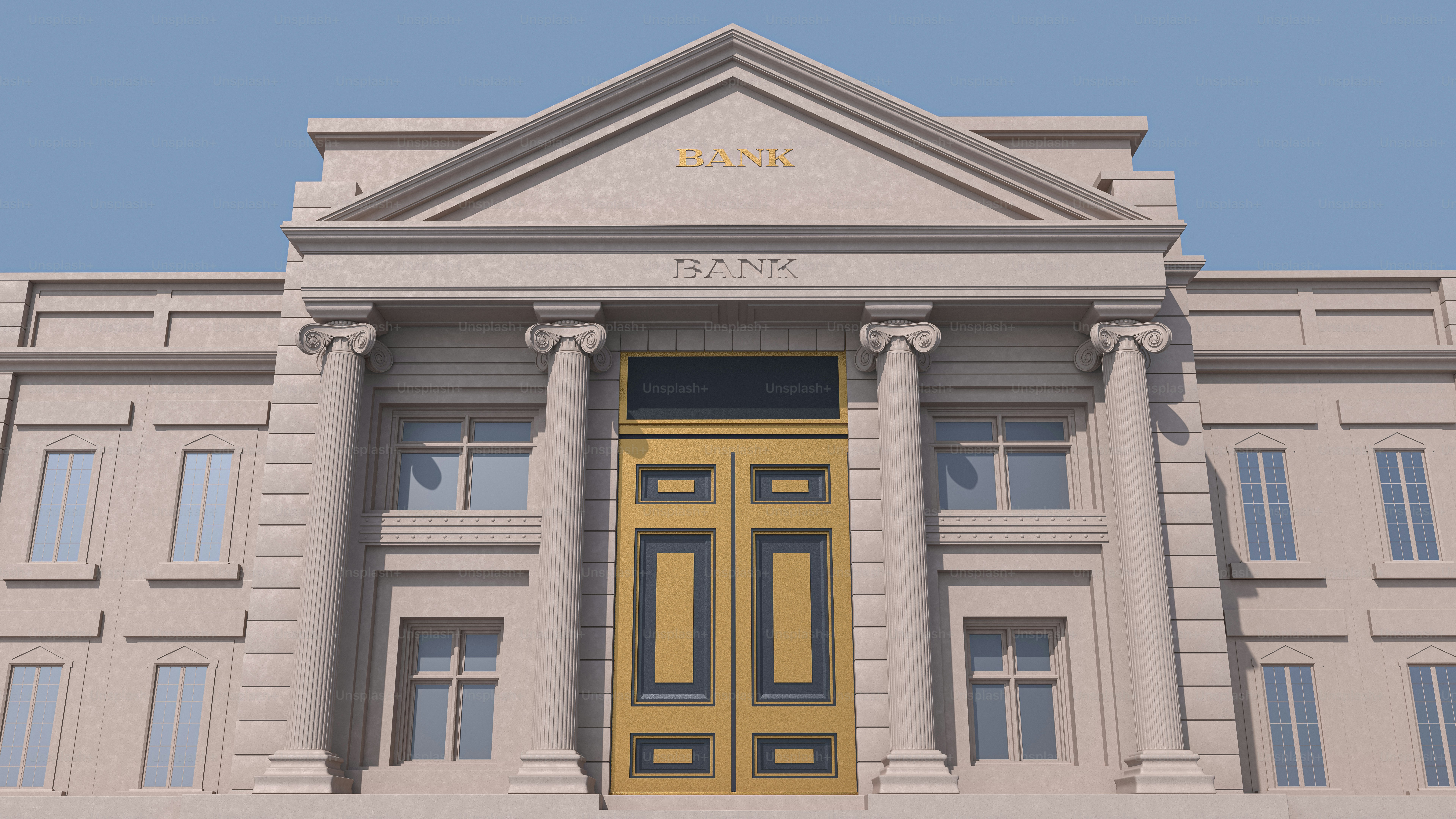 Grand building entrance with large gold doors and columns