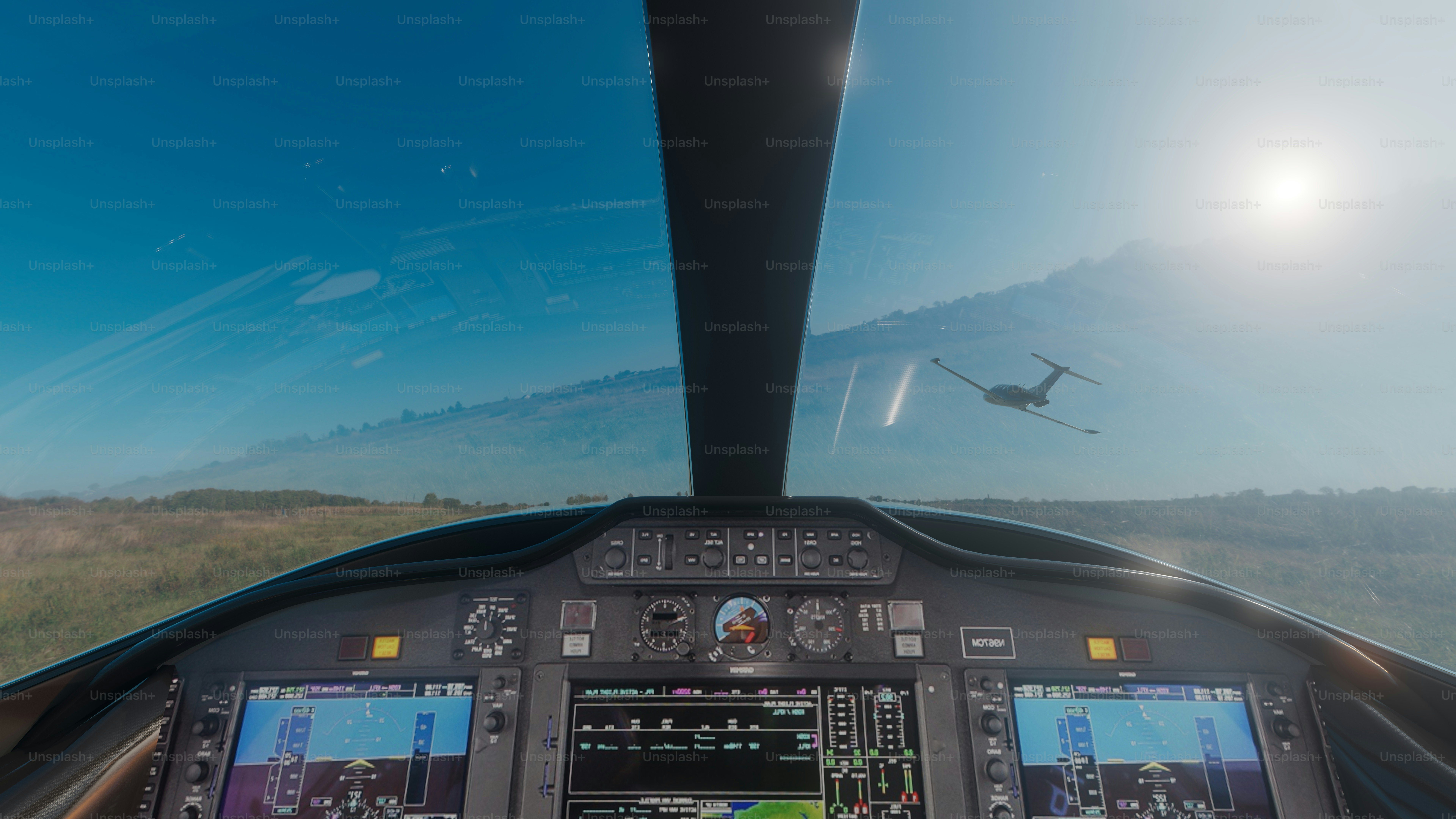 Vista da cabina do piloto do avião que voa sobre a terra