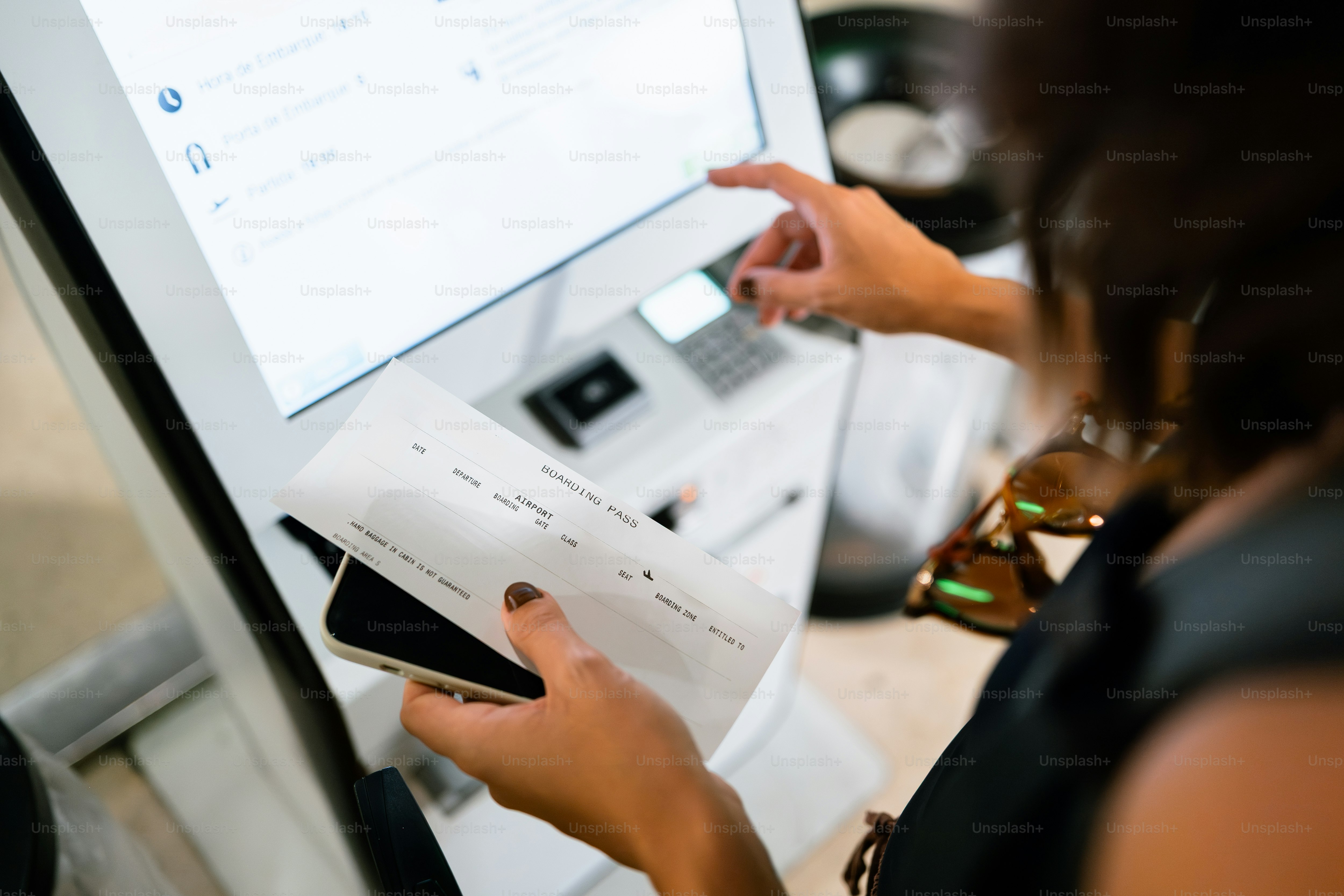 Woman using a touchscreen kiosk photo – Travel Image on Unsplash