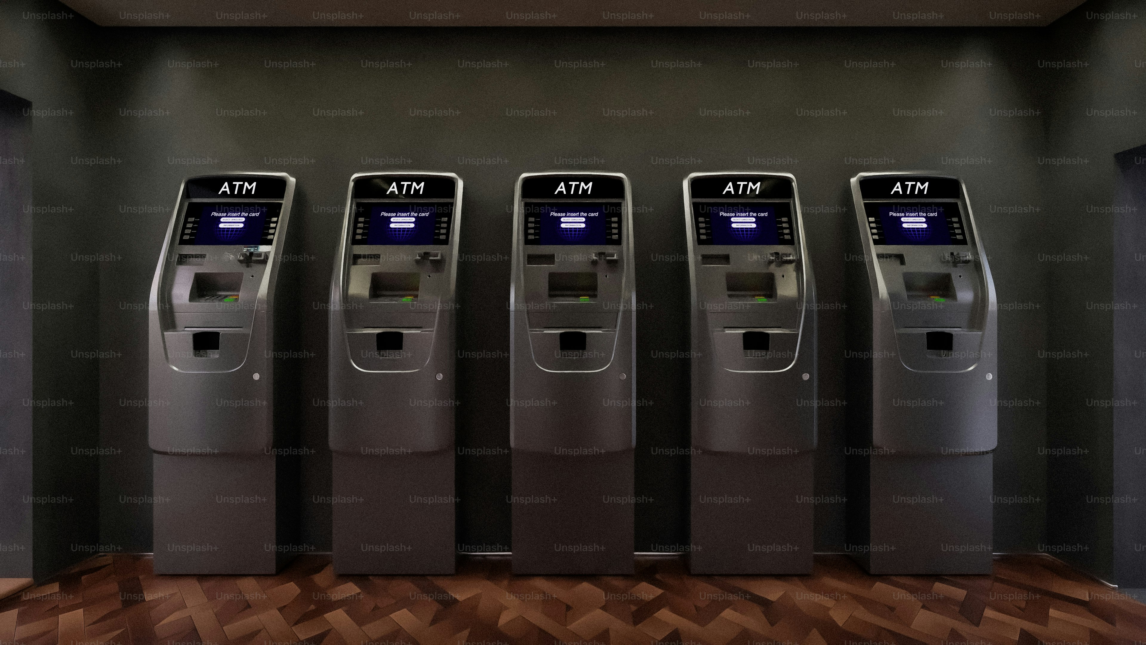 Five modern ticket machines lined up in a row photo – Building Image on ...