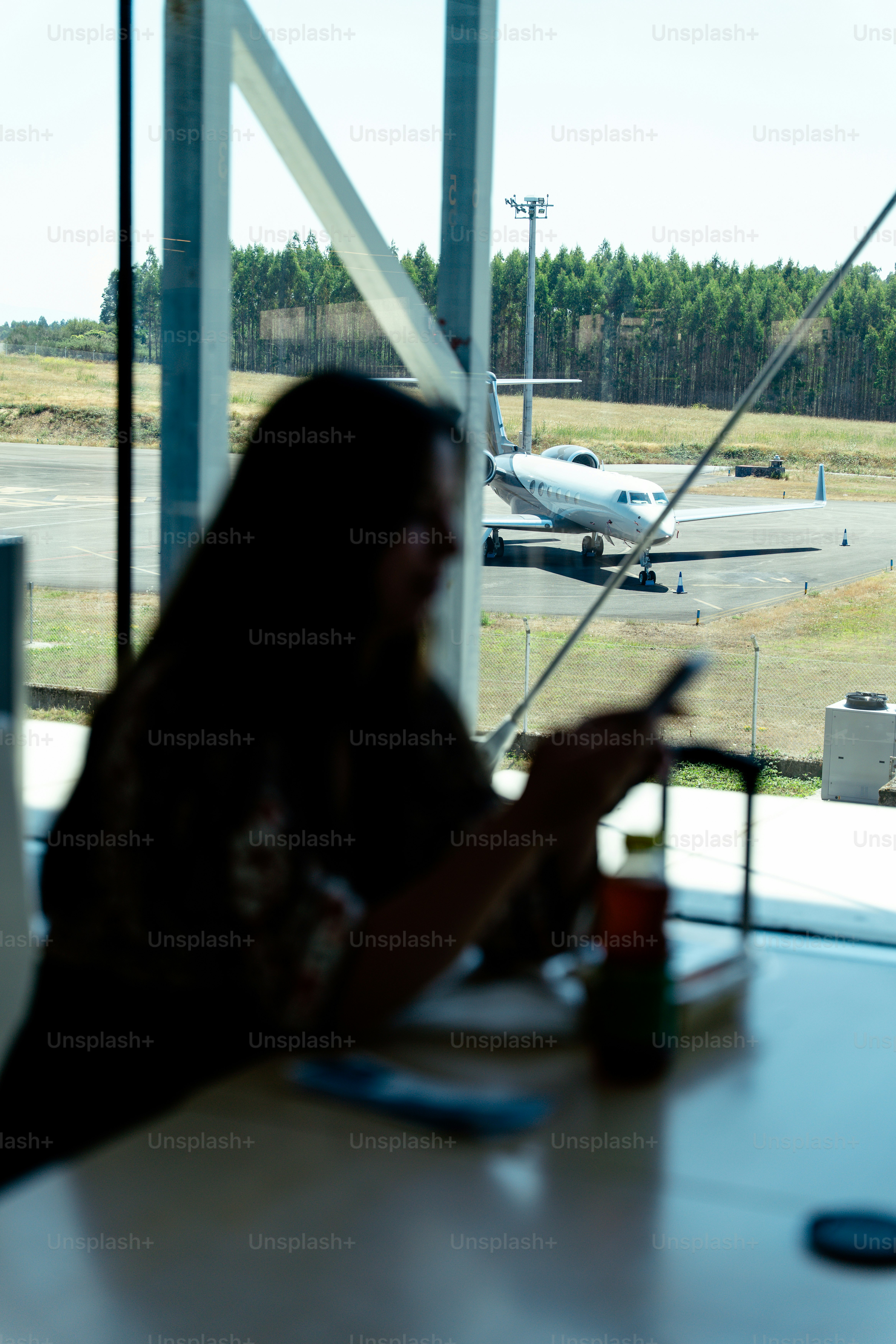 Affluent traveler walking through airport with luxury travel insurance protection in mind