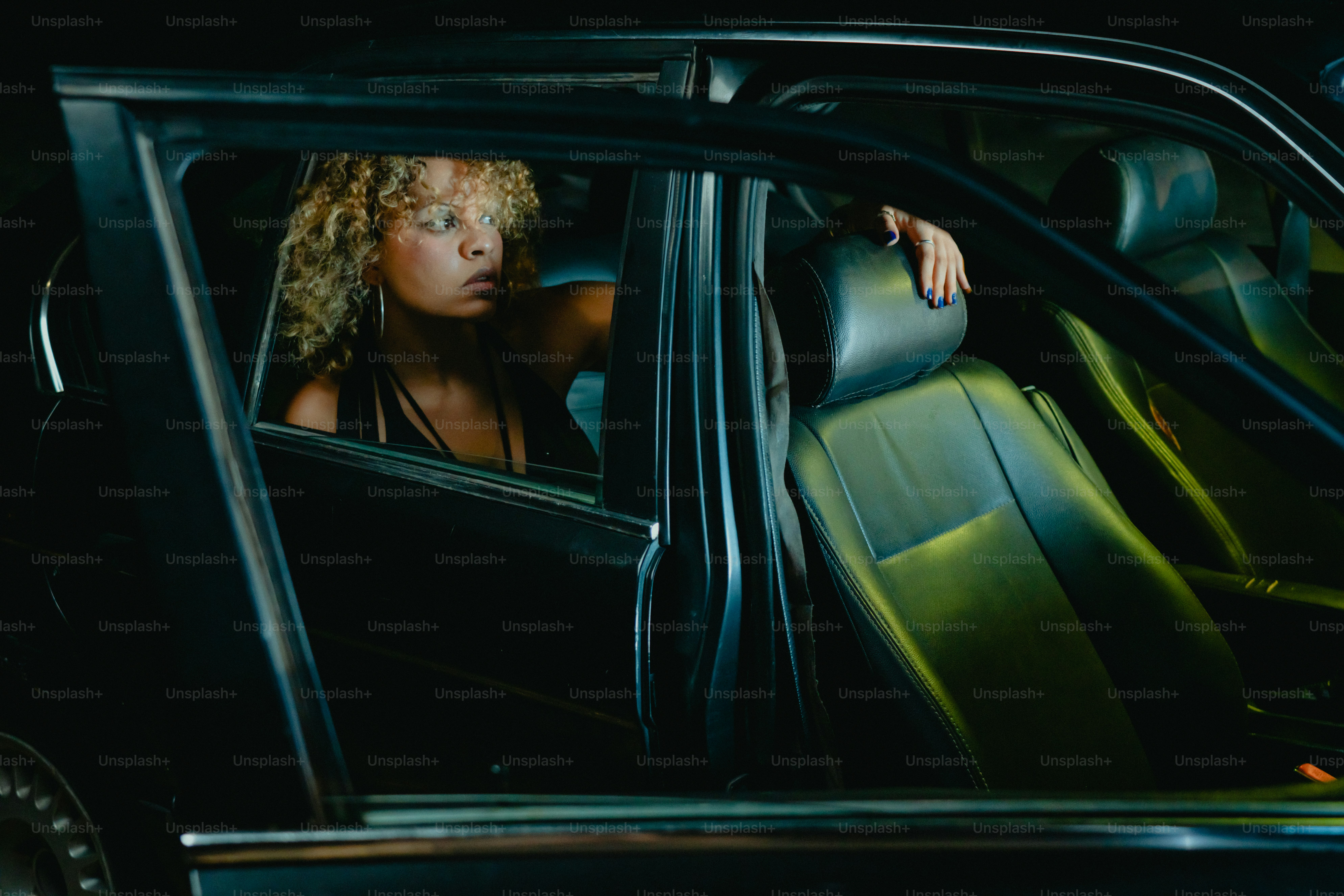 Woman looking out of a car window photo – Cinematic Image on Unsplash