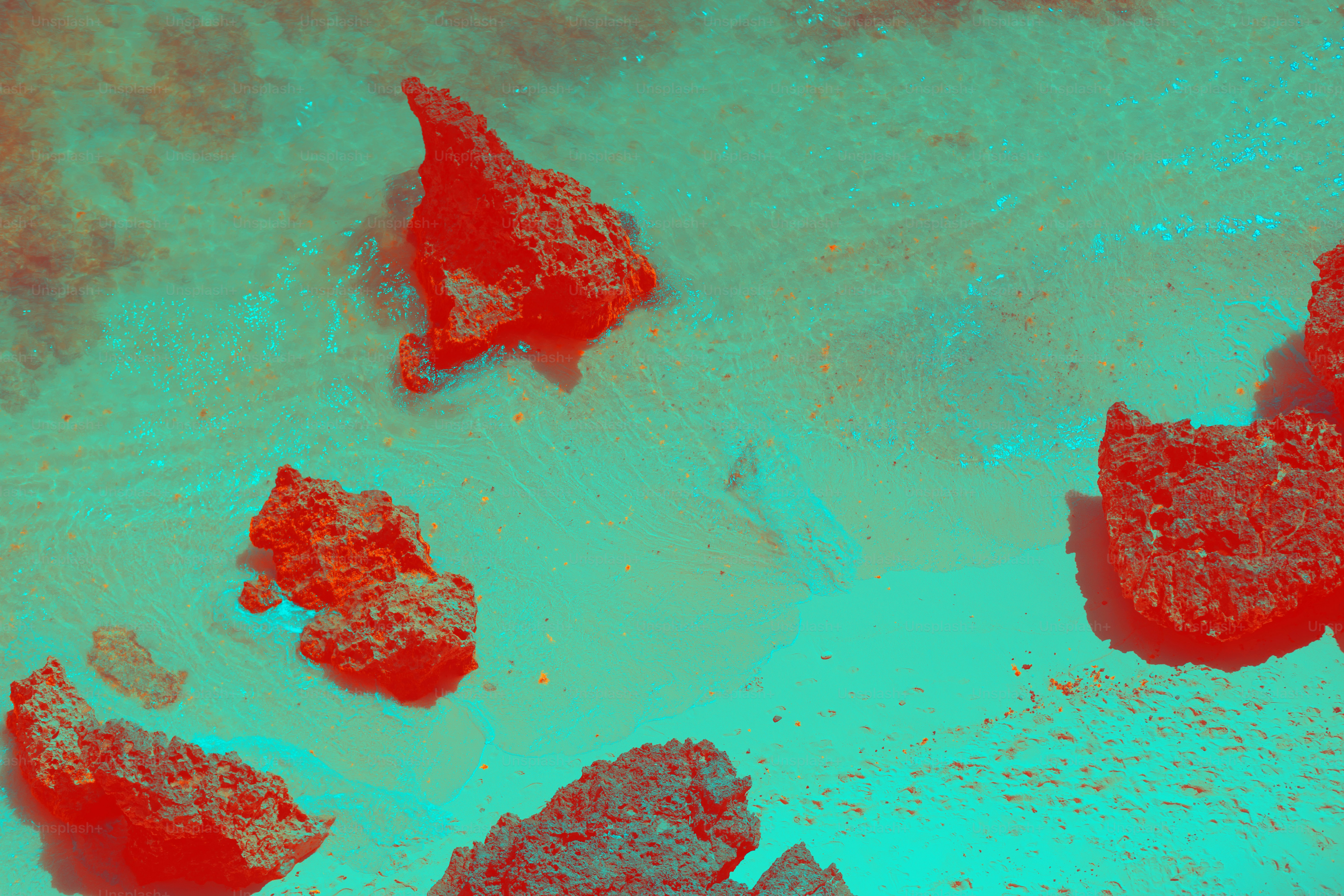 Formas abstratas vermelhas em um fundo azul-petróleo