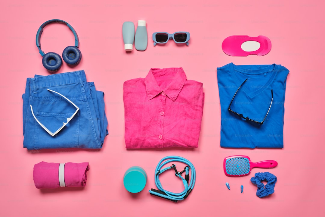 Flat lay of travel essentials and clothing items
