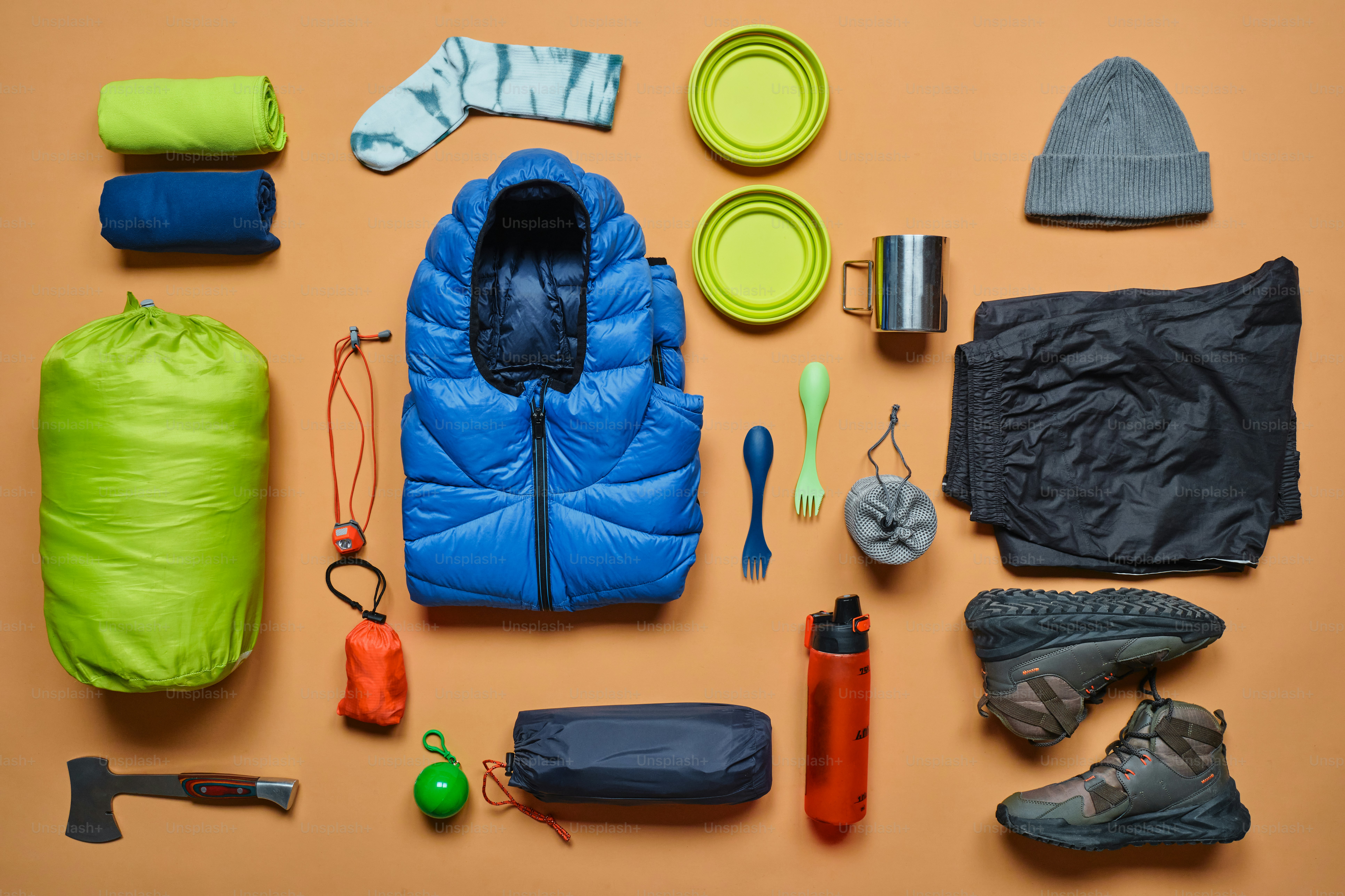 Overhead view of camping gear laid out flat.