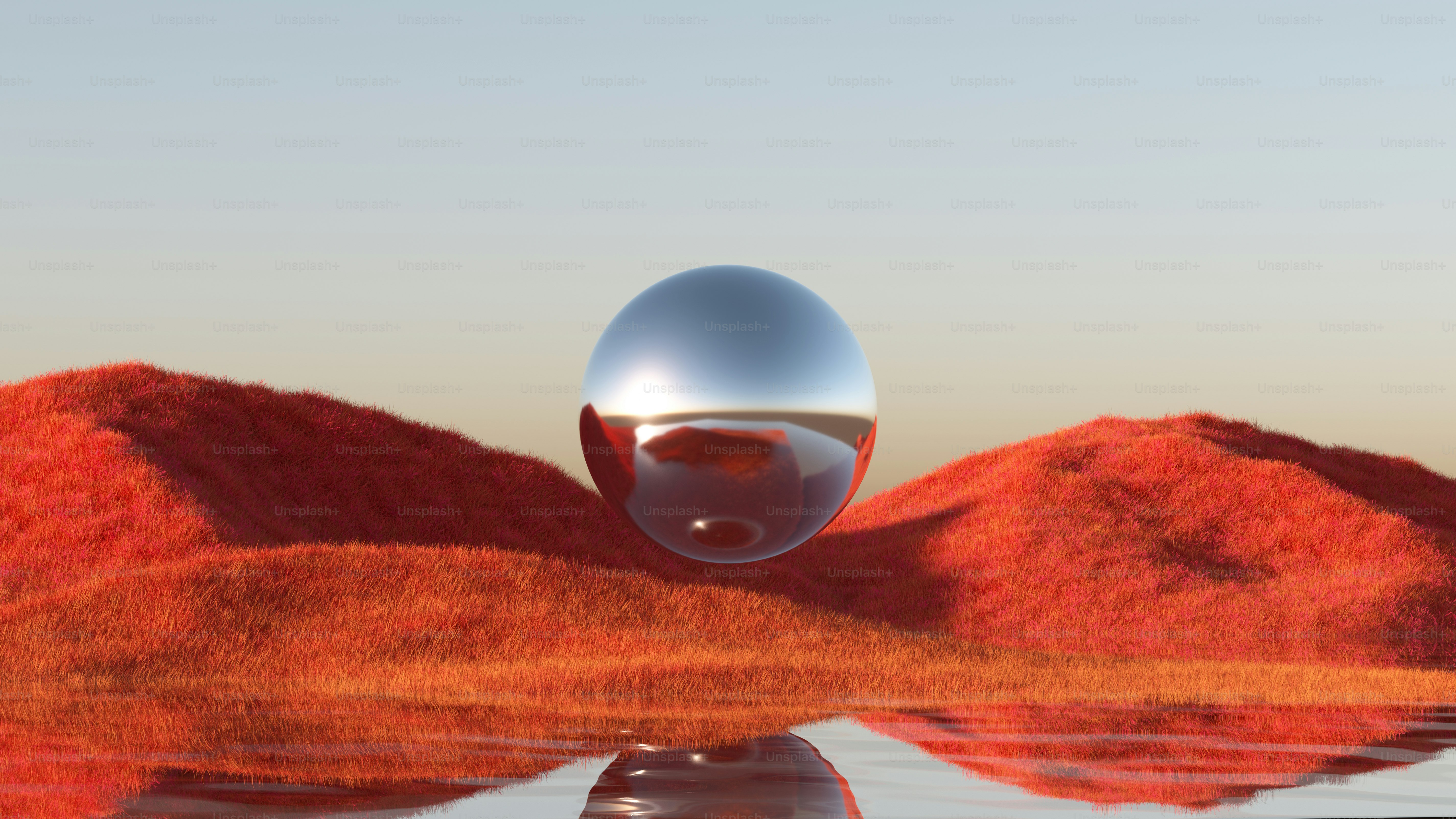 反射球体は2つの赤い丘の間にあります。