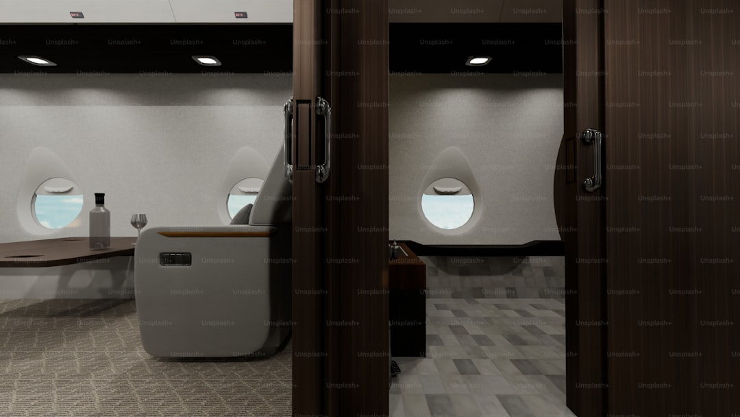 Luxurious private jet interior with plush seating and windows