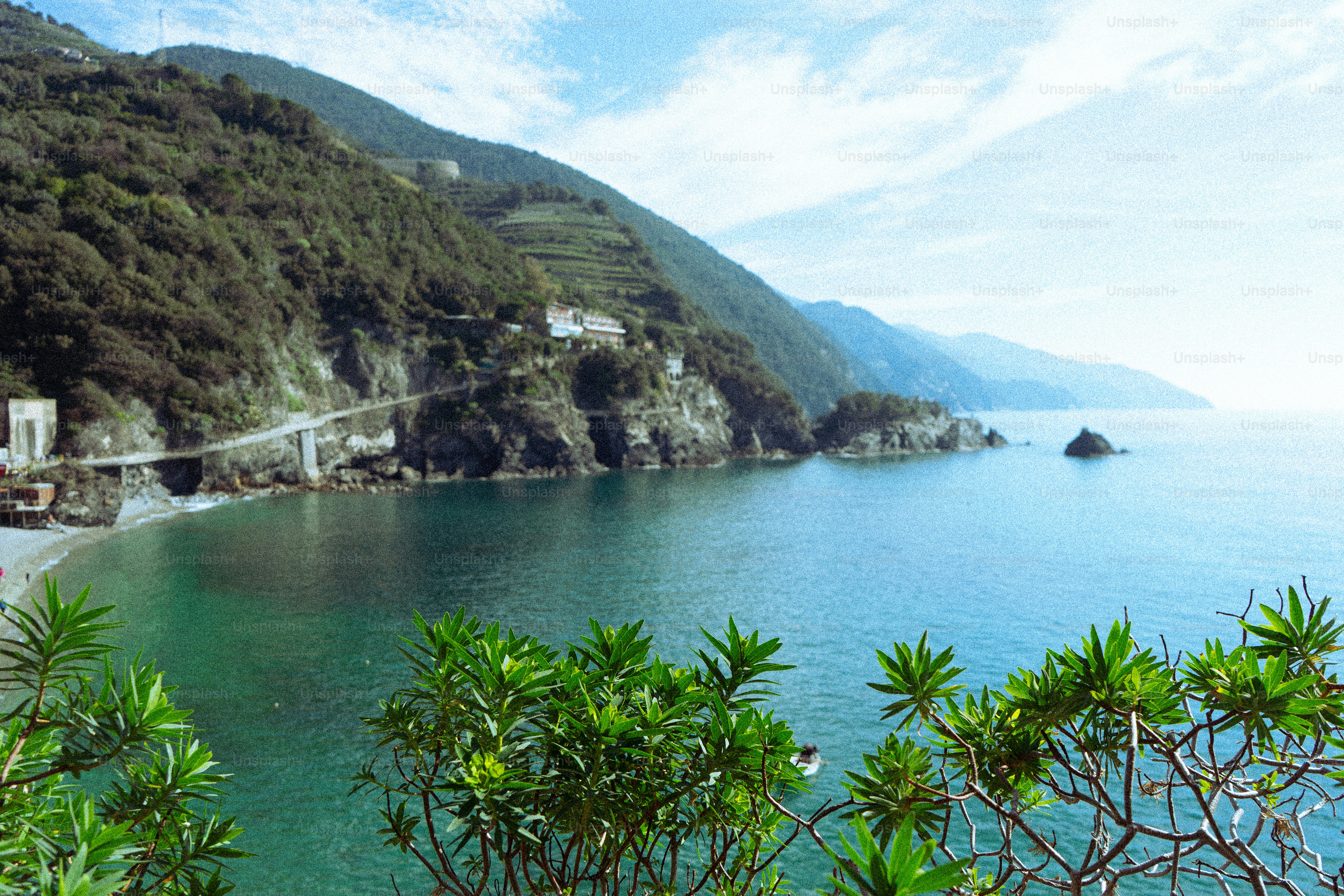 Coastal village nestled on a cliff overlooking the sea.