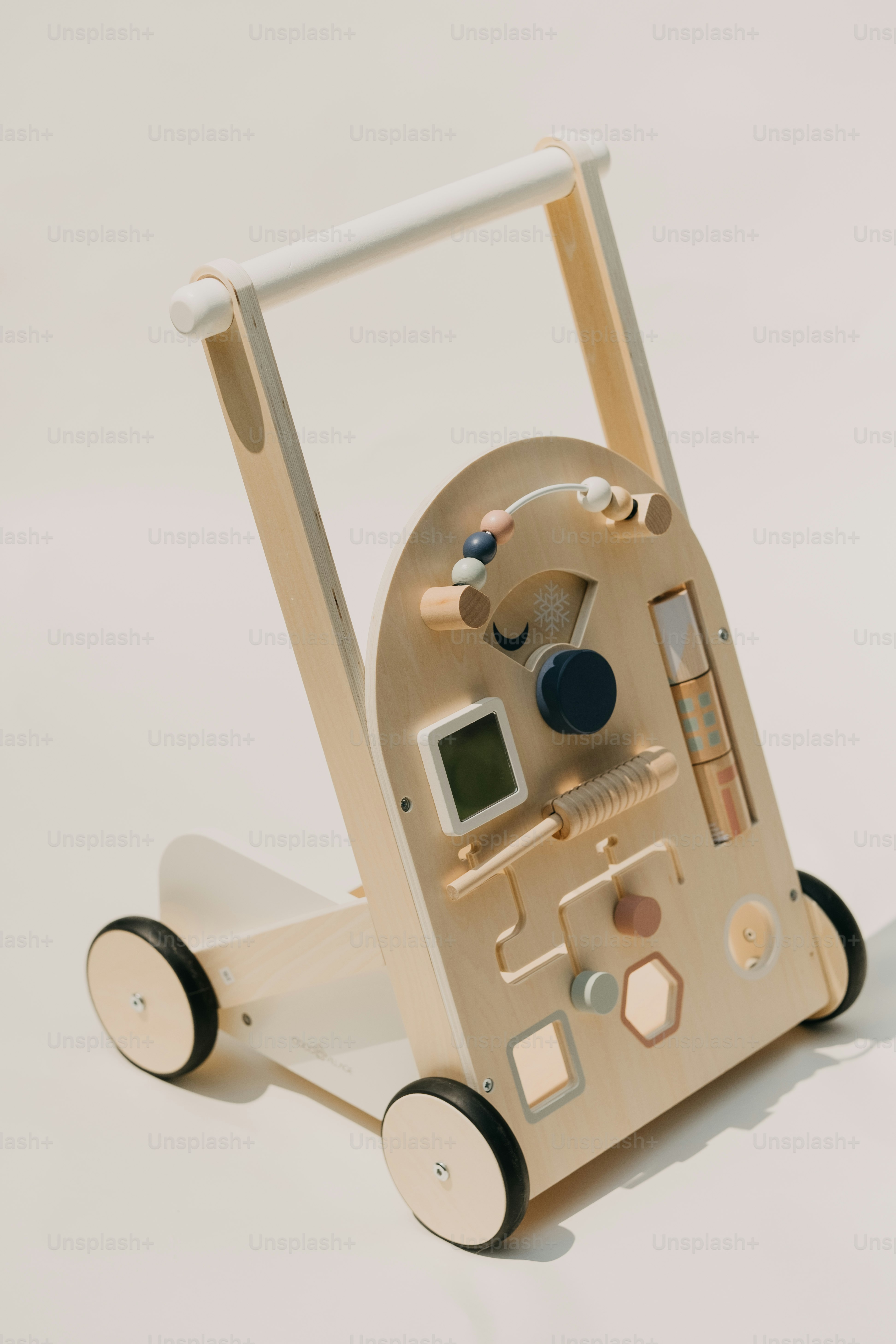 Wooden baby walker with various activity toys