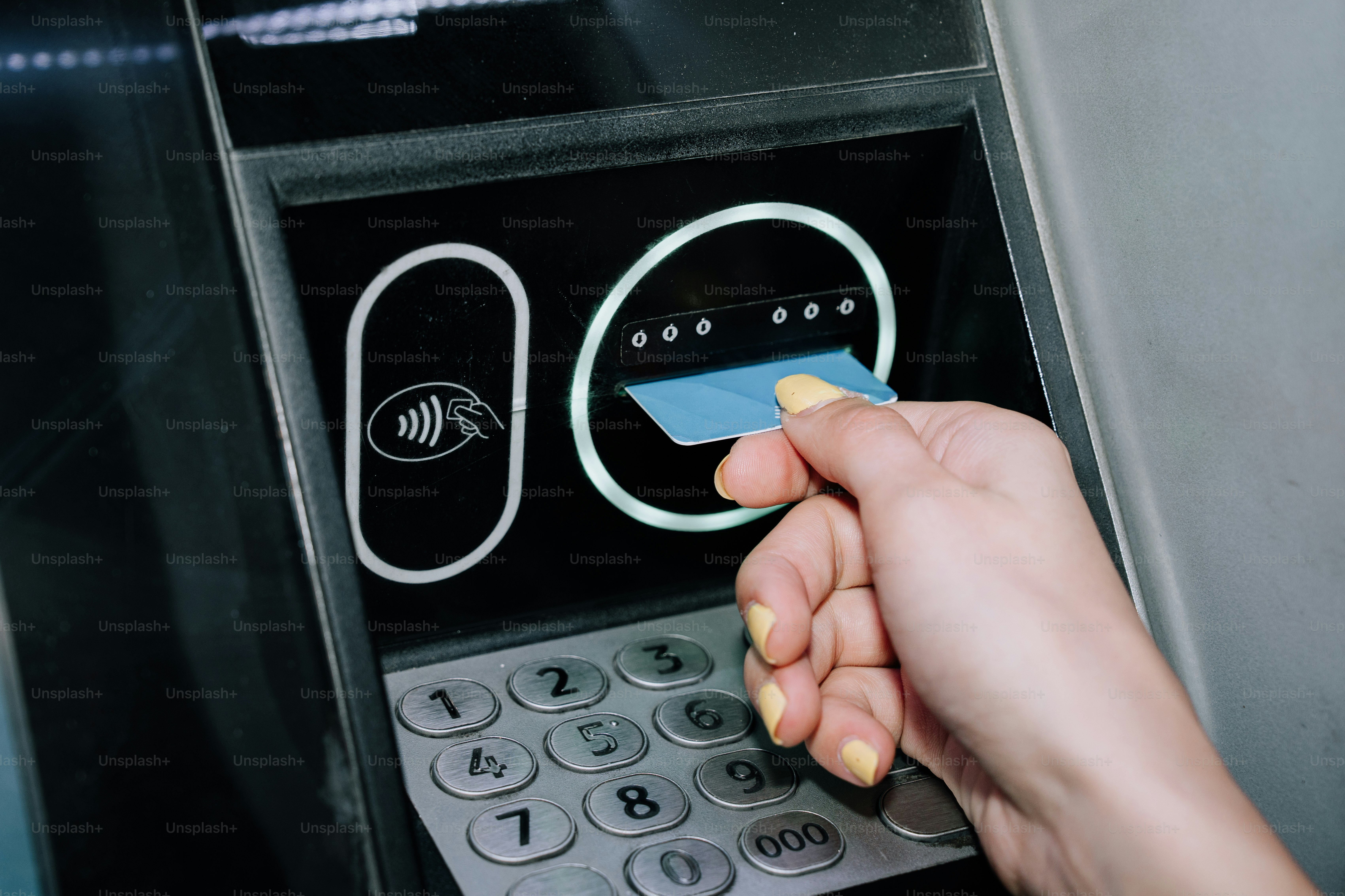 People using atms at night photo – Money Image on Unsplash