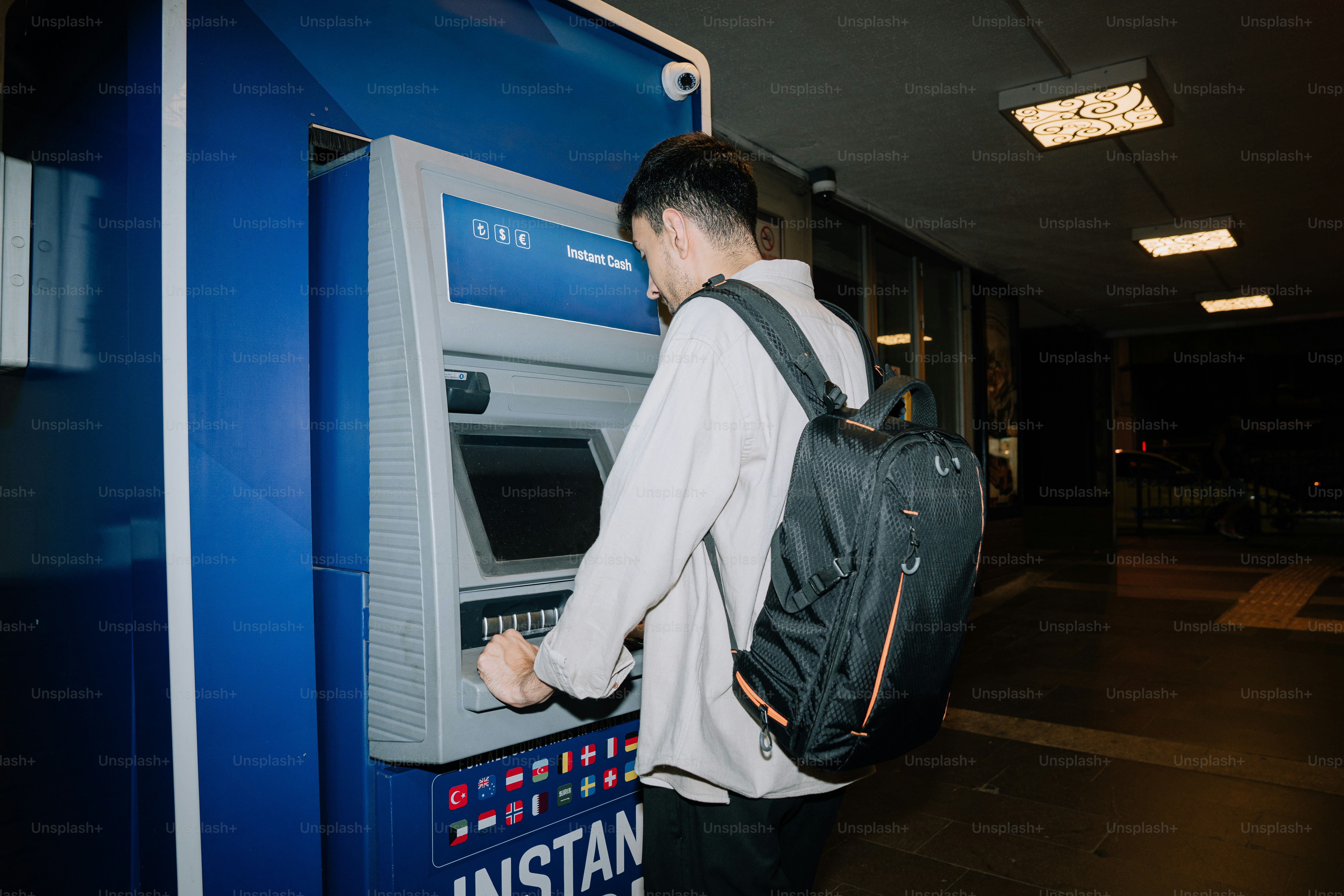 Person inserting card into atm machine photo – Money Image on Unsplash