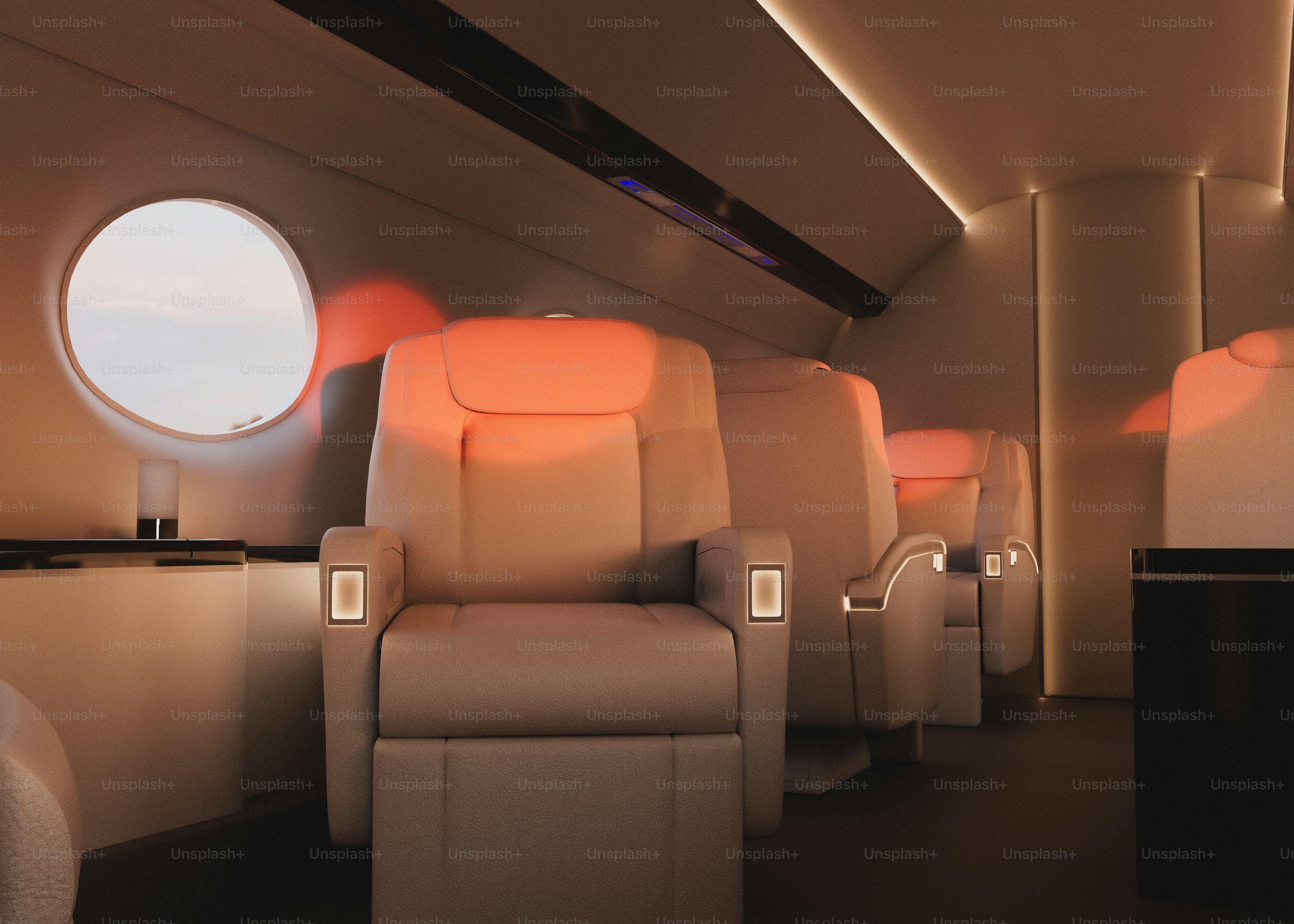 Luxurious private jet interior with comfortable seating.