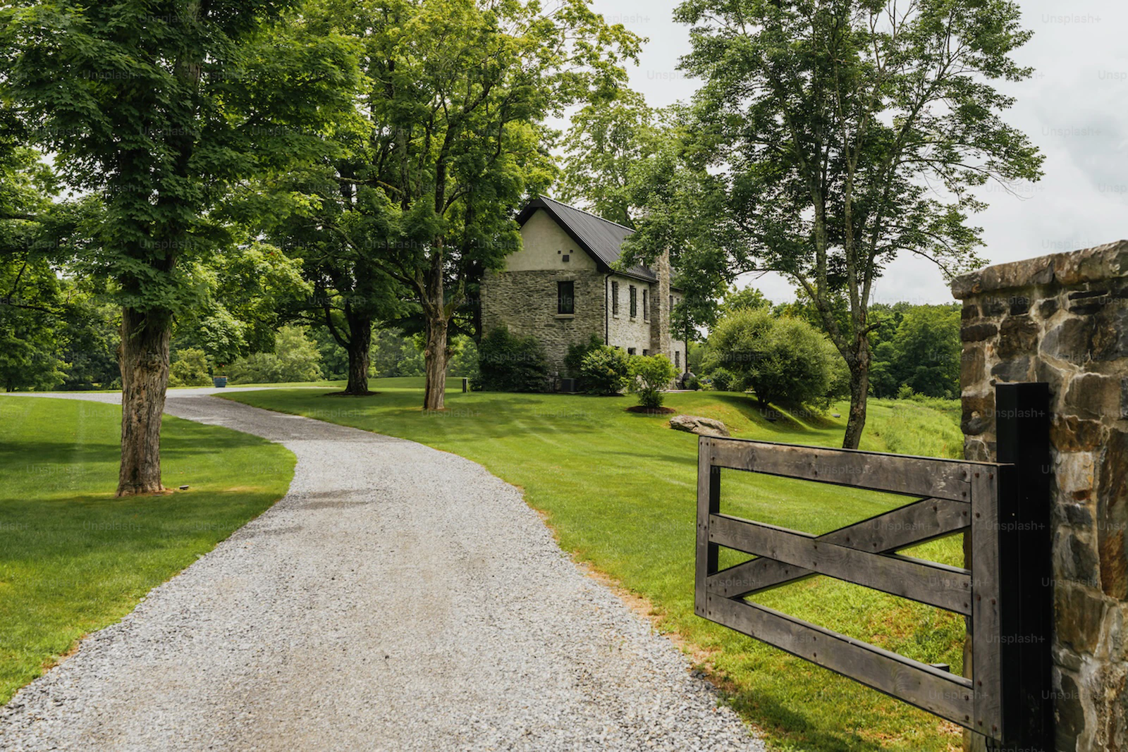 Wood and metal driveway gate