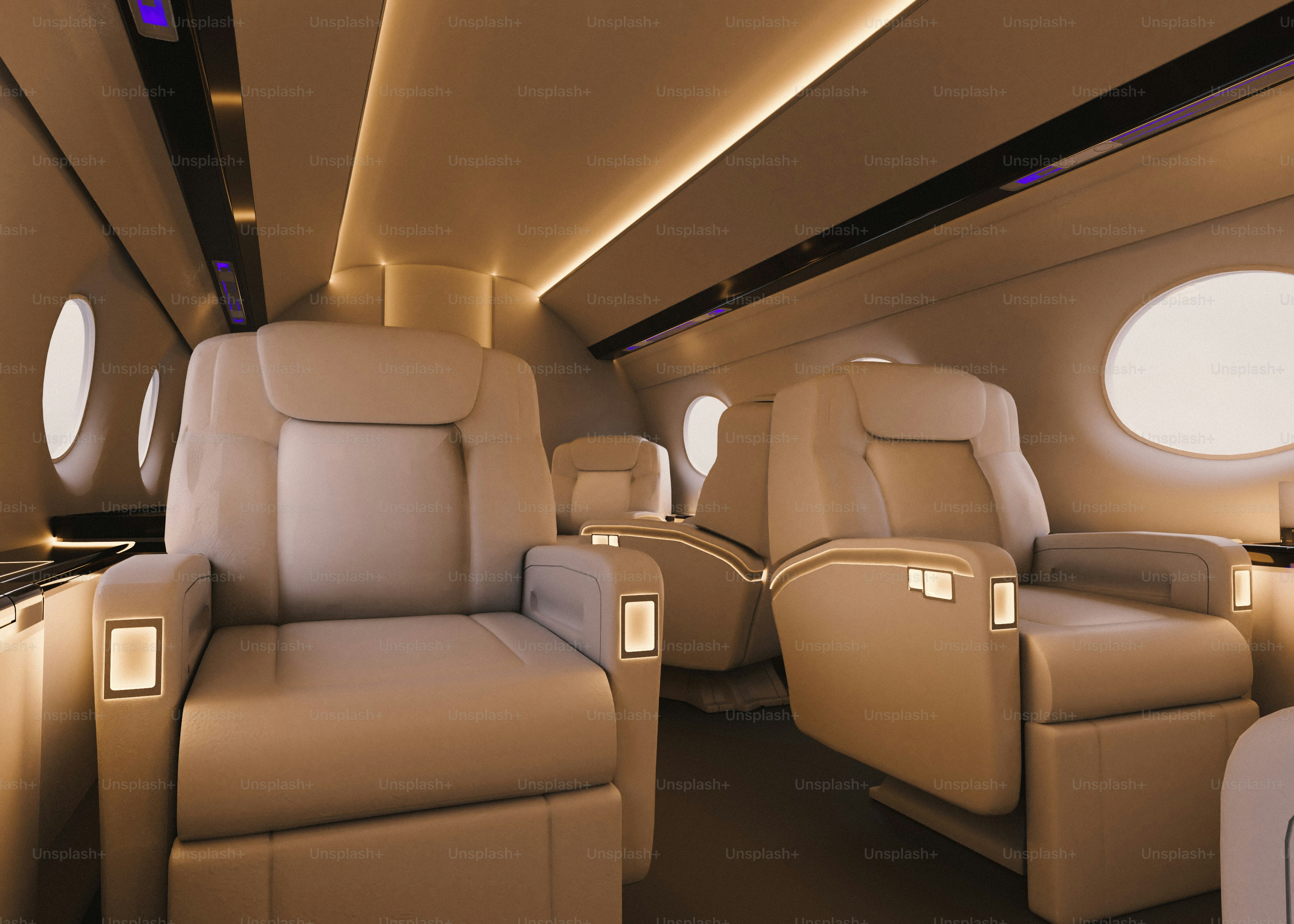 Luxurious interior of a private jet with plush seating.