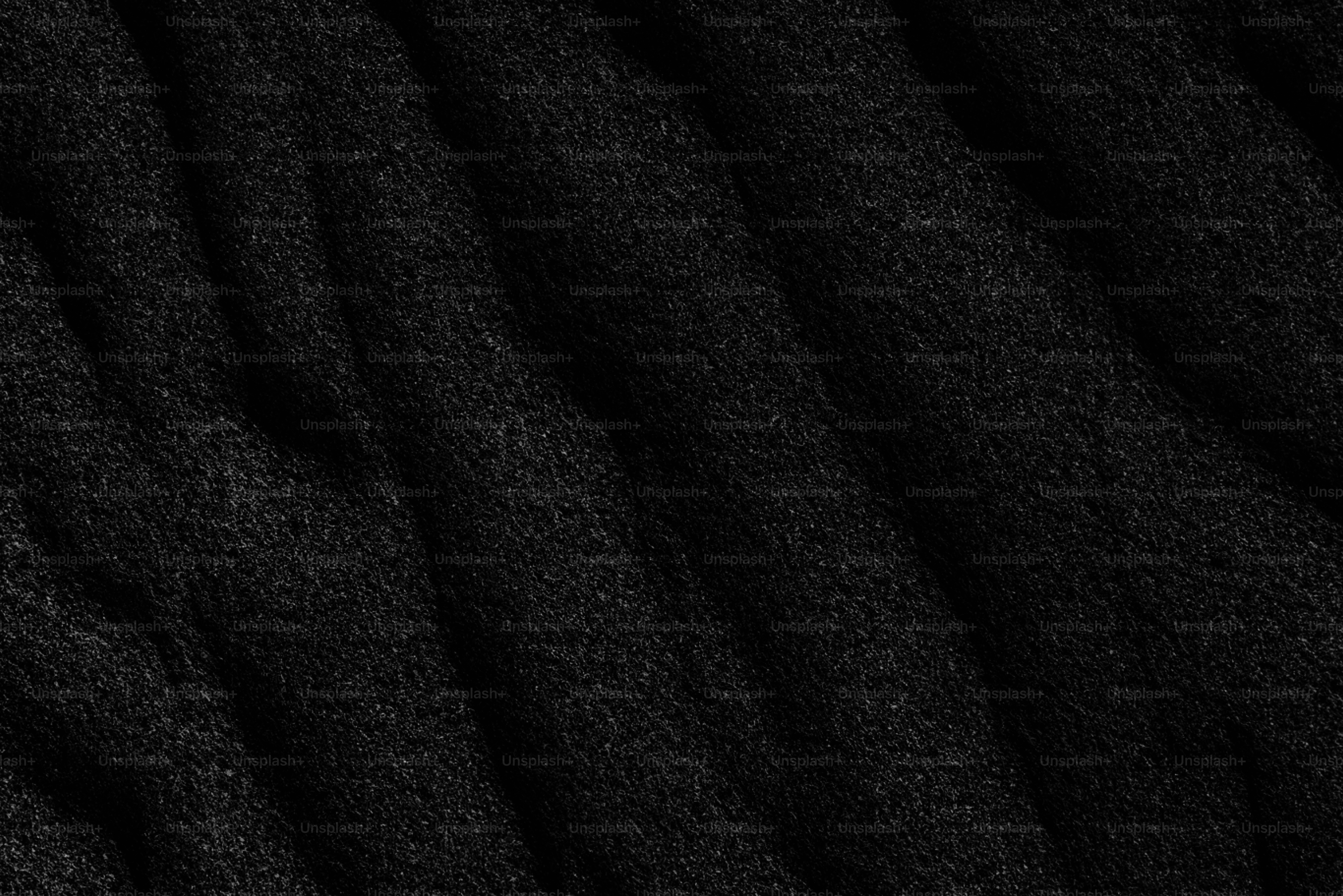 Close-up of thick, dark gray wool yarn strands