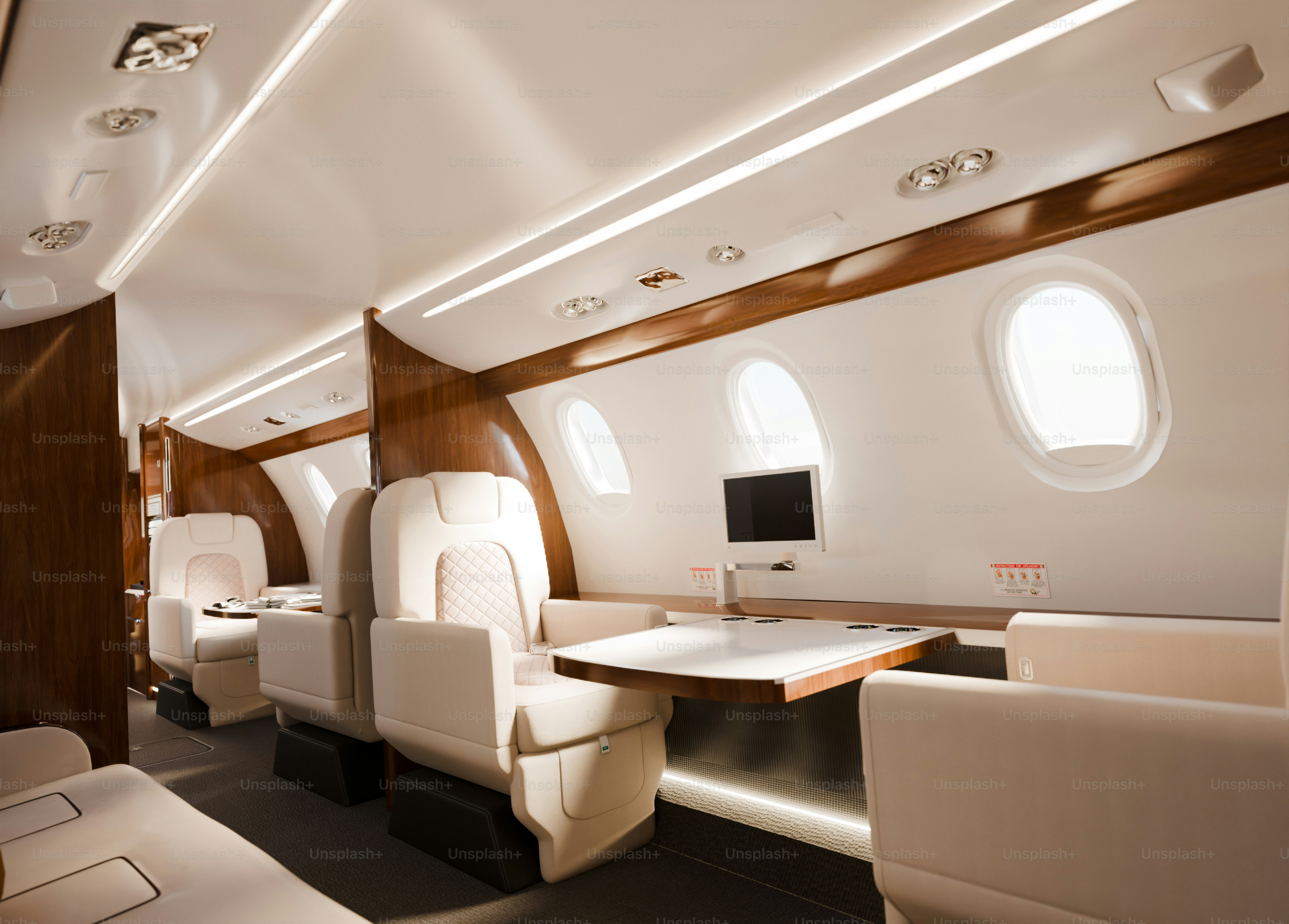 Luxurious interior of a private jet with comfortable seating
