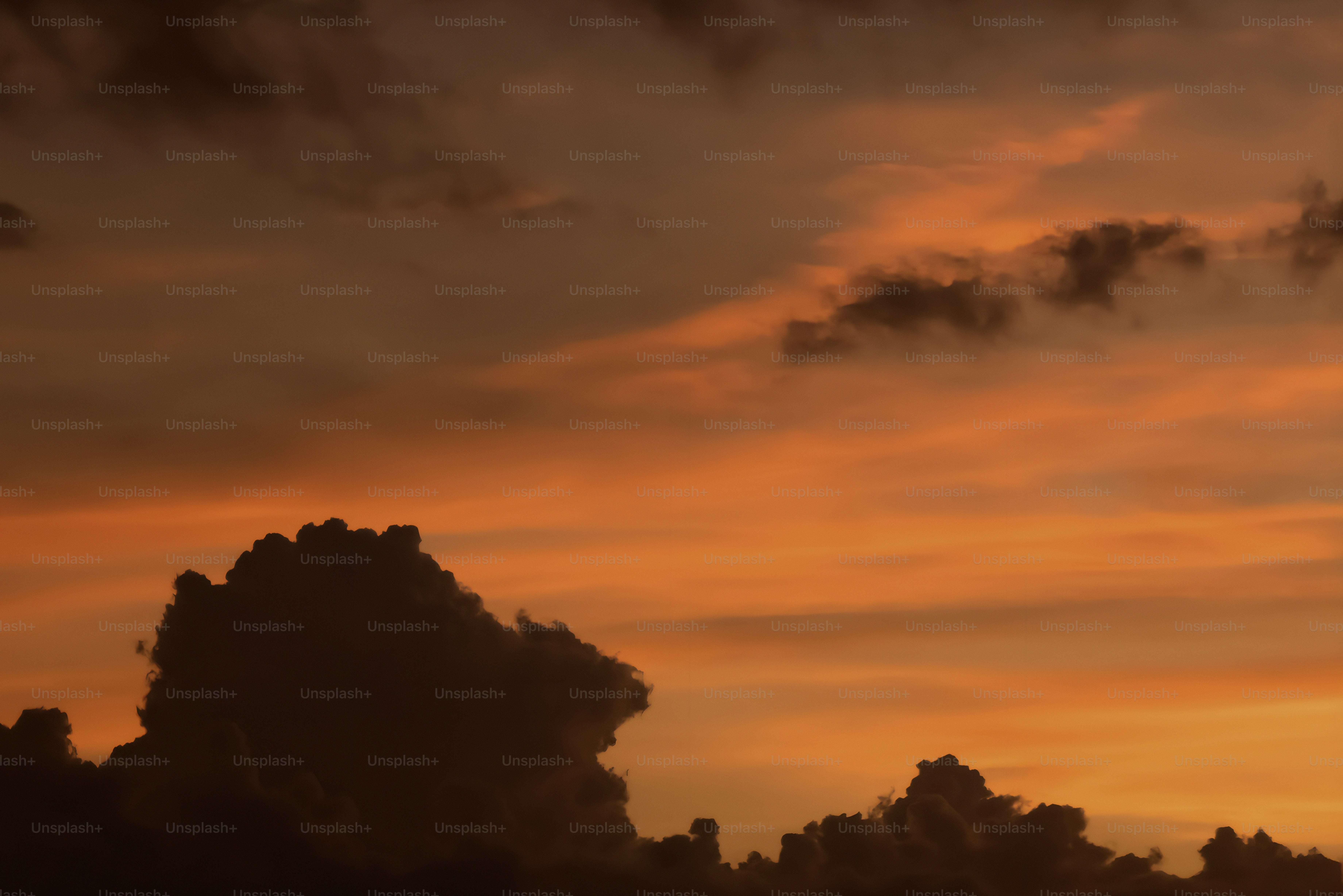 Dramatic sunset clouds with vibrant orange and red hues