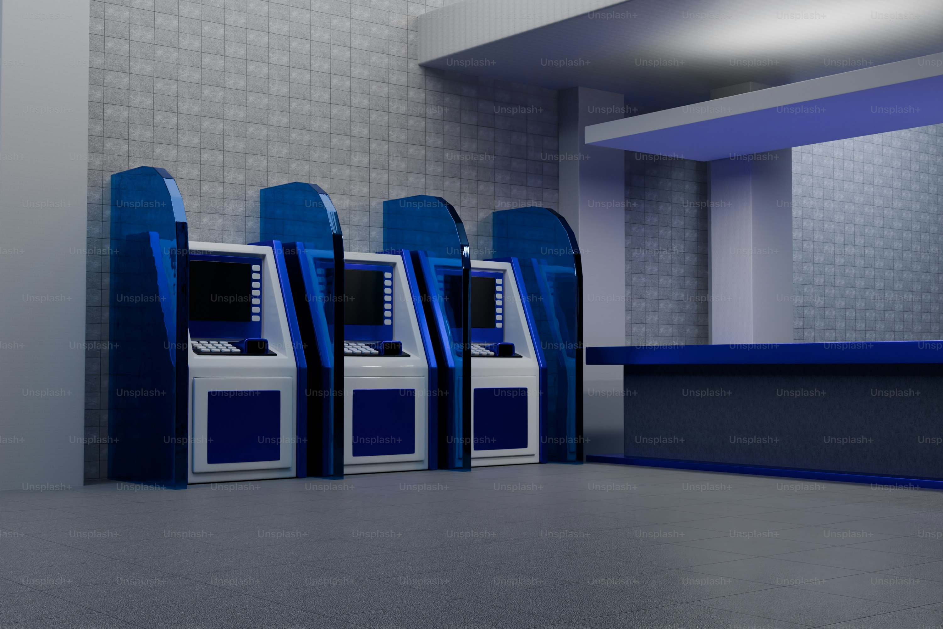 Four blue and white atms lined up in a bank lobby.